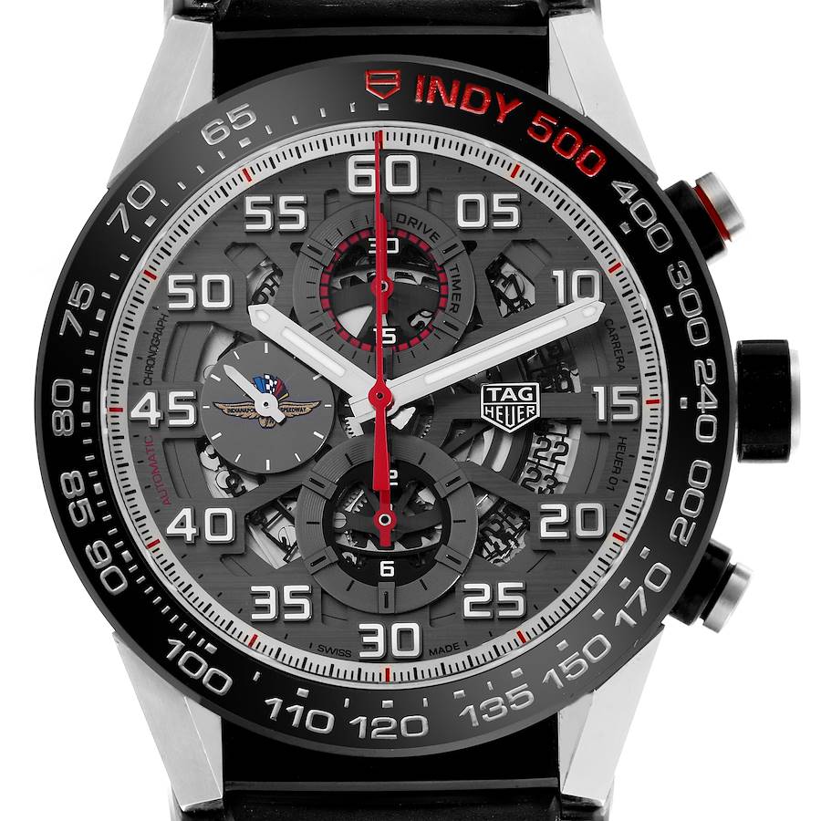 The Tag Heuer Carrera watch is shown from a top-down angle, highlighting the intricate face and bezel details.