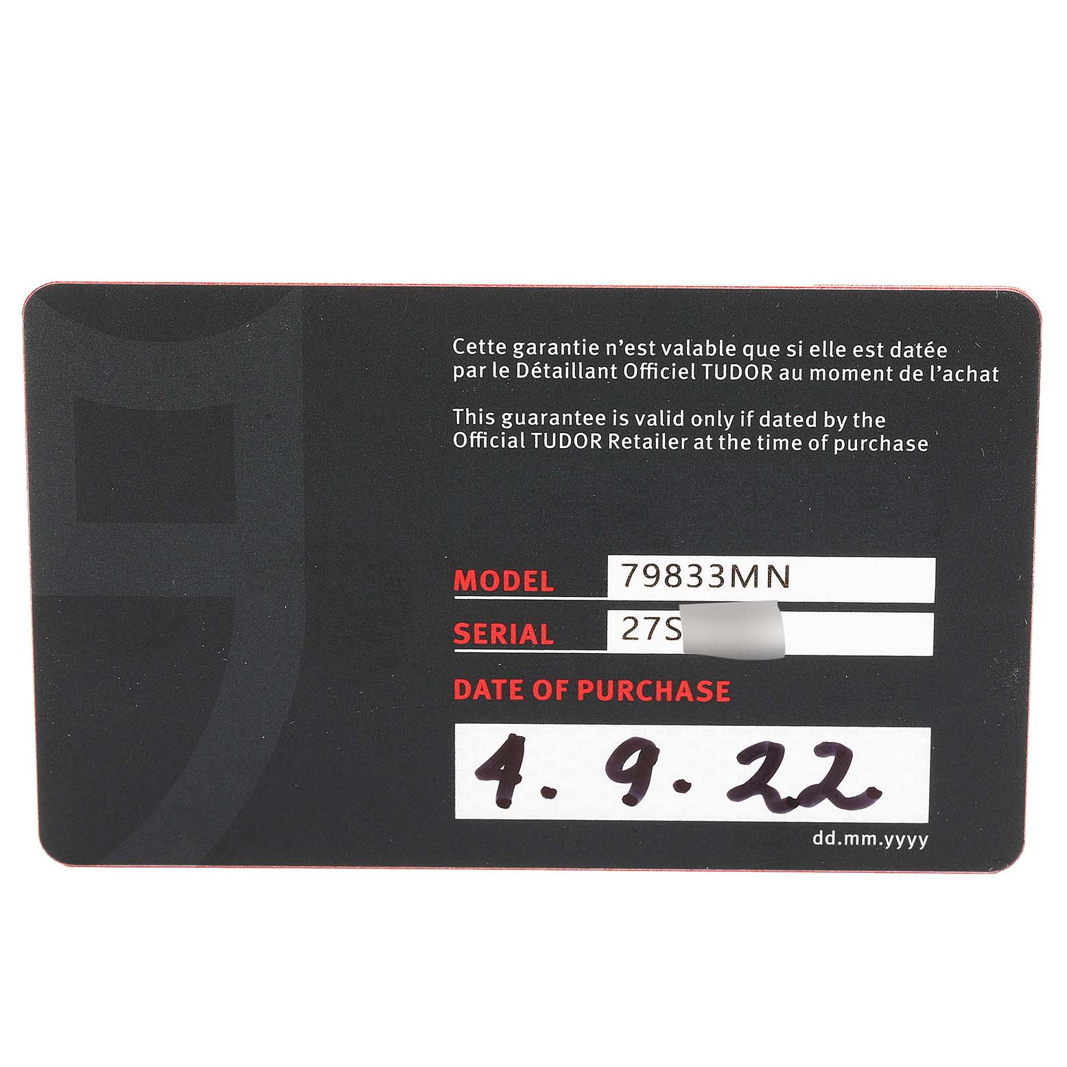This image shows the warranty card for the Tudor Heritage Black Bay 79833MN Men's Stainless Steel Black Dial 79833MN Men's Stainless Steel Black Dial model, indicating the model number, serial number, and purchase date.