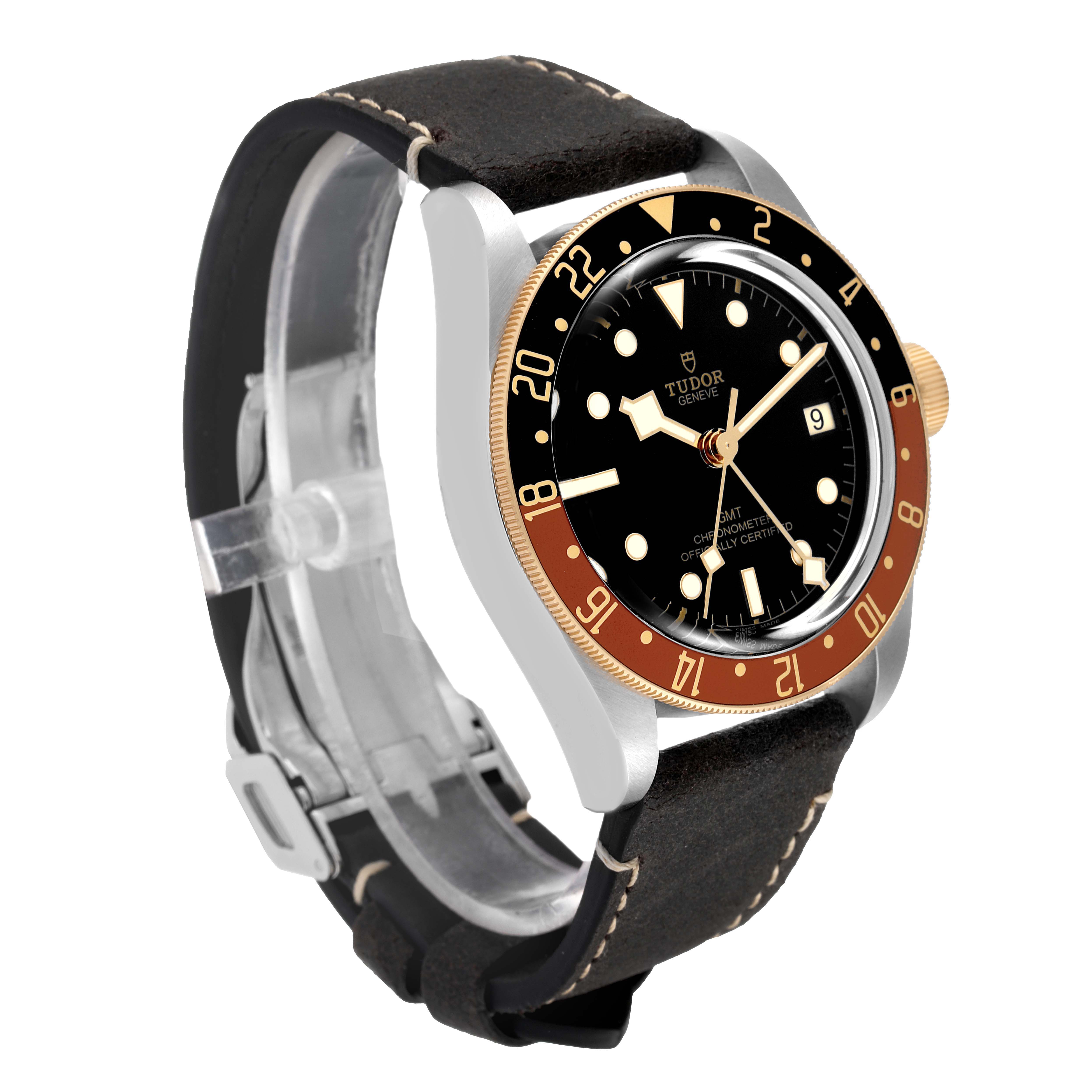 The image shows a front-left angle of the Tudor Heritage Black Bay 79833MN Men's Stainless Steel Black Dial 79833MN Men's Stainless Steel Black Dial watch, highlighting its dial, bezel, crown, and leather strap.