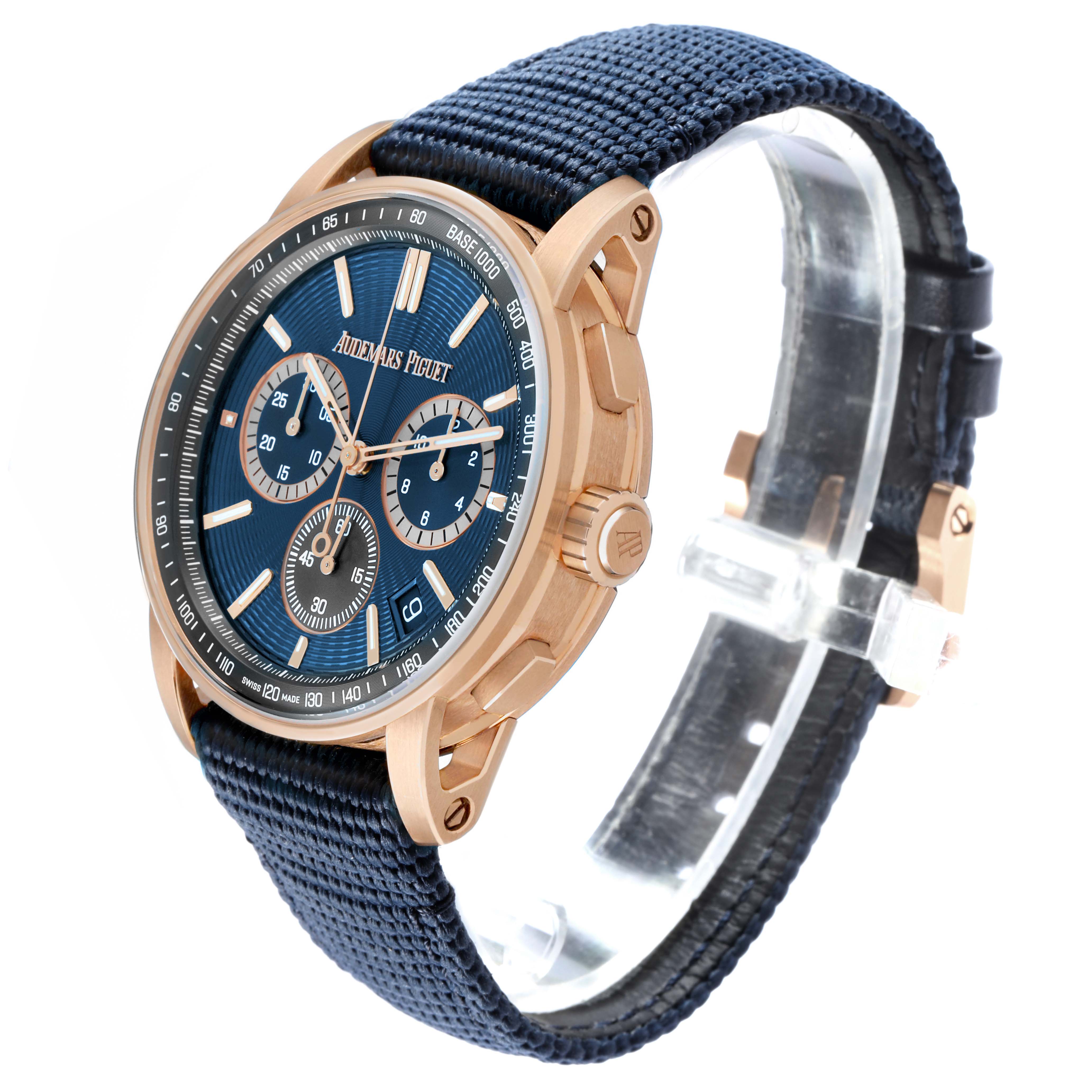 The Audemars Piguet Code 11.59 26393OR Men's Rose Gold Blue Dial watch is shown at a three-quarter angle, highlighting the dial, crown, and strap.