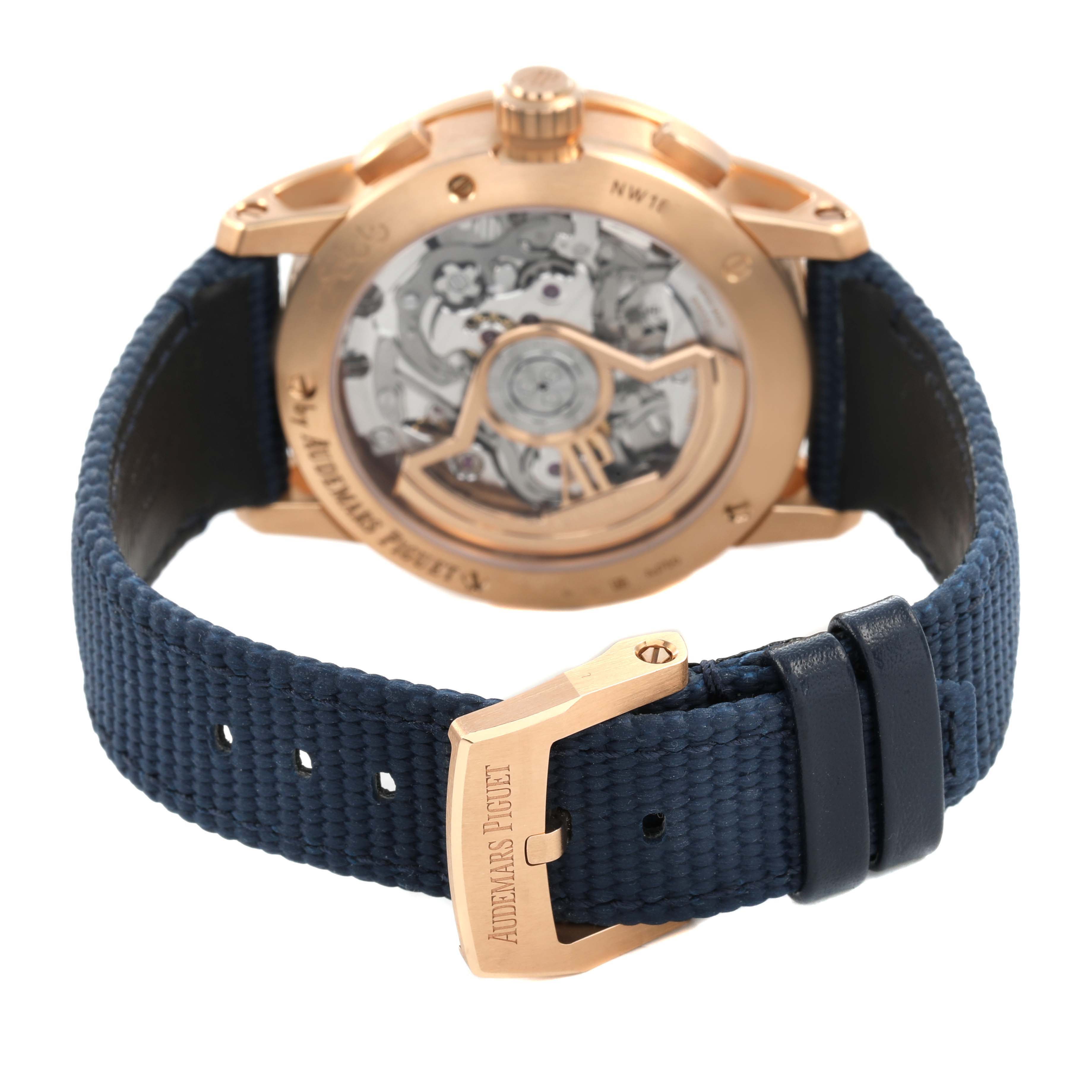 The image shows the back view of an Audemars Piguet Code 11.59 26393OR Men's Rose Gold Blue Dial watch, highlighting the movement and strap.