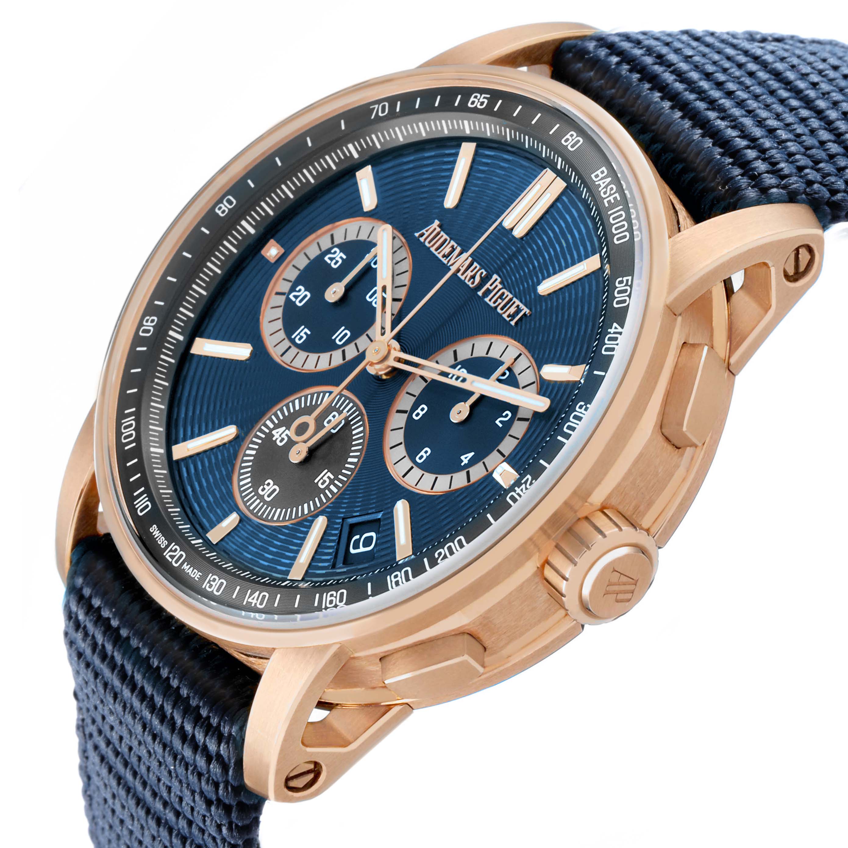 The Audemars Piguet Code 11.59 26393OR Men's Rose Gold Blue Dial is shown at an angle highlighting the blue dial, rose gold case, crown, and lugs.