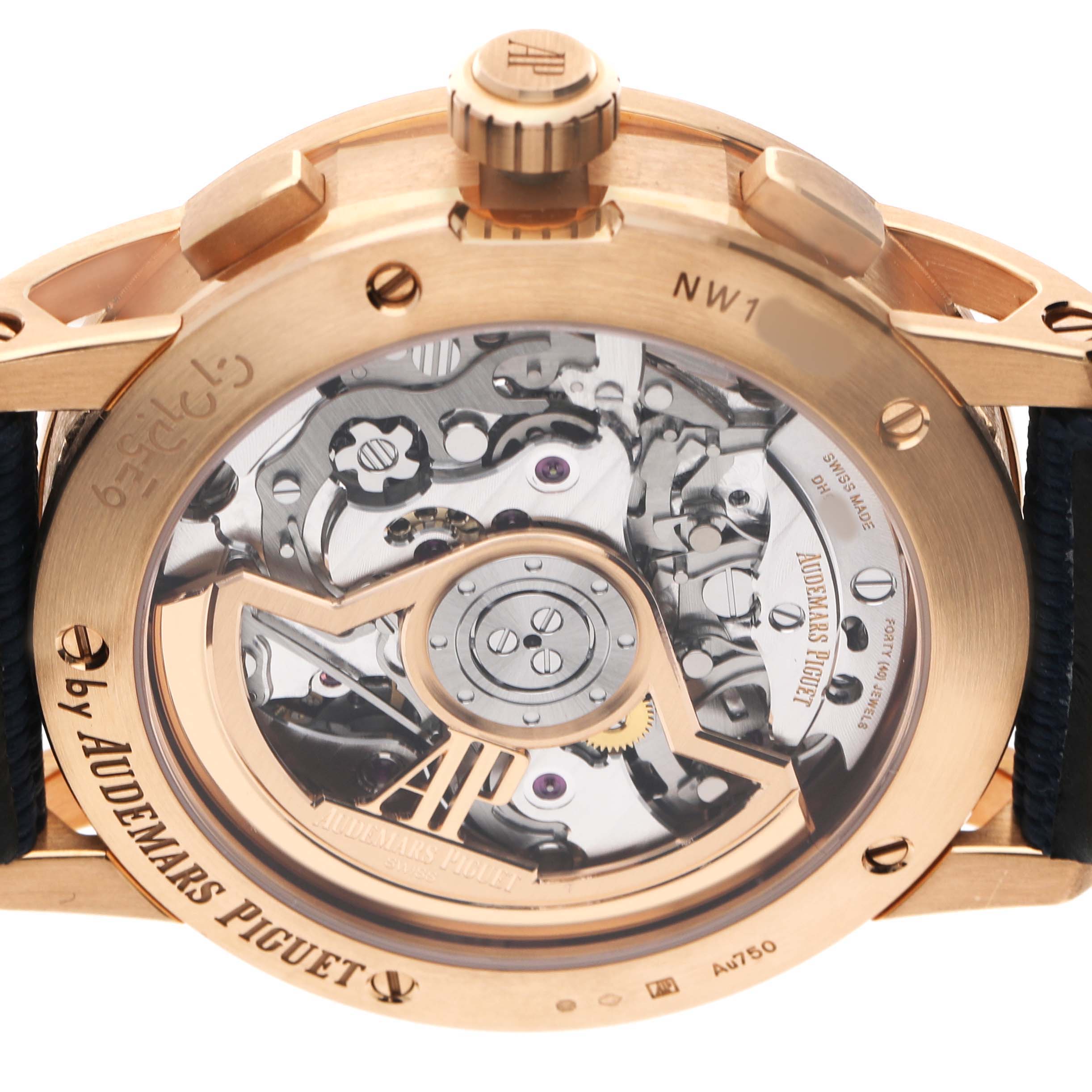 The image shows the back view of the Audemars Piguet Code 11.59 26393OR Men's Rose Gold Blue Dial, highlighting its intricate movement and rotor details.
