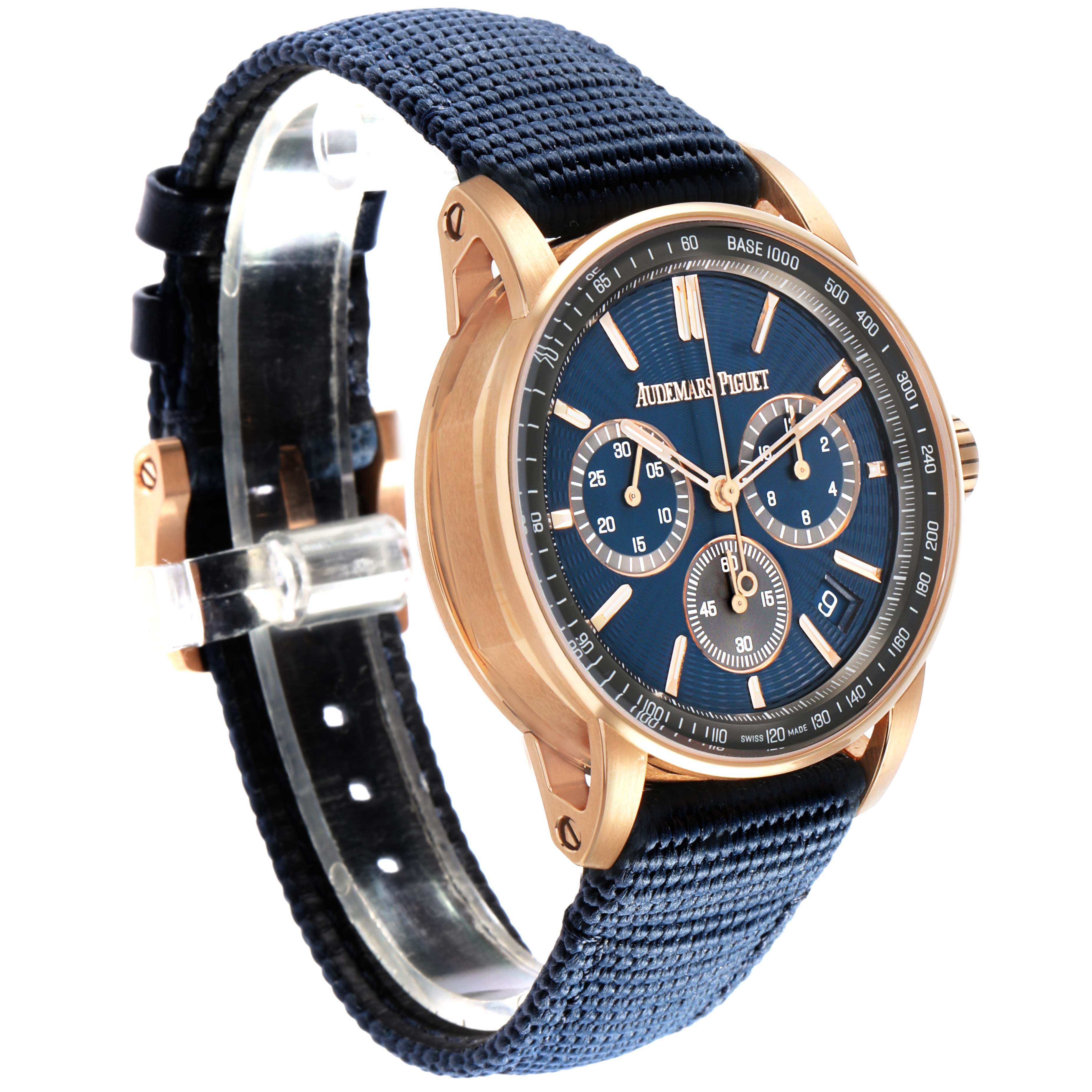 The Audemars Piguet Code 11.59 26393OR Men's Rose Gold Blue Dial watch is shown at an angle highlighting the blue dial, rose gold case, and blue strap.