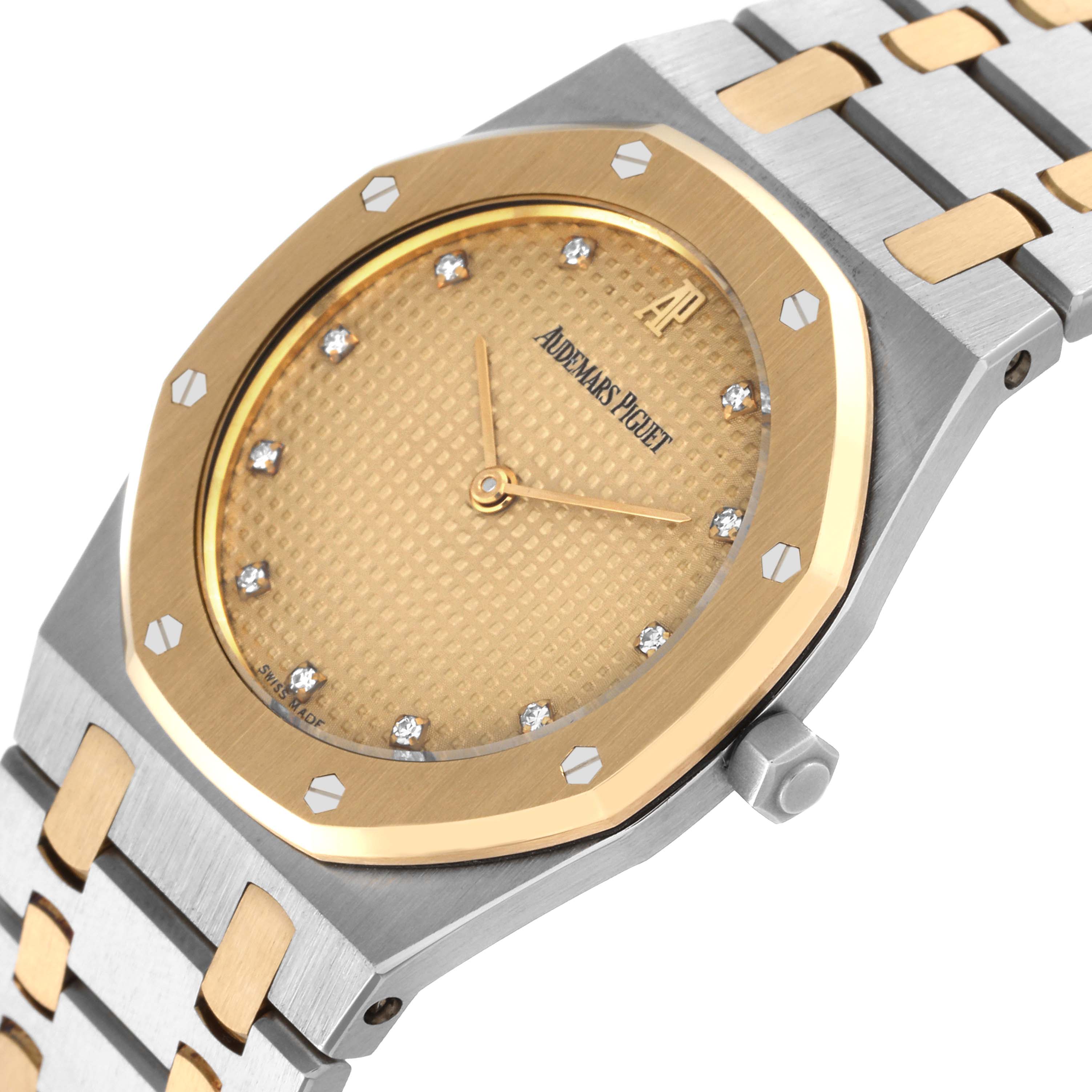 This image shows a close-up of the Audemars Piguet Royal Oak 56303SA Men's Steel and Gold (two tone) Champagne Dial 56303SA Men's Steel and Gold (two tone) Champagne Dial watch, highlighting the dial, bezel, and part of the bracelet.