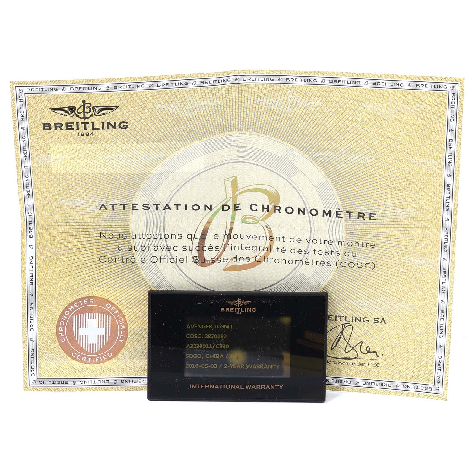 The image shows the Breitling Avenger A32390 Men's Stainless Steel Blue Dial A32390 Men's Stainless Steel Blue Dial II GMT warranty card and chronometer certificate.