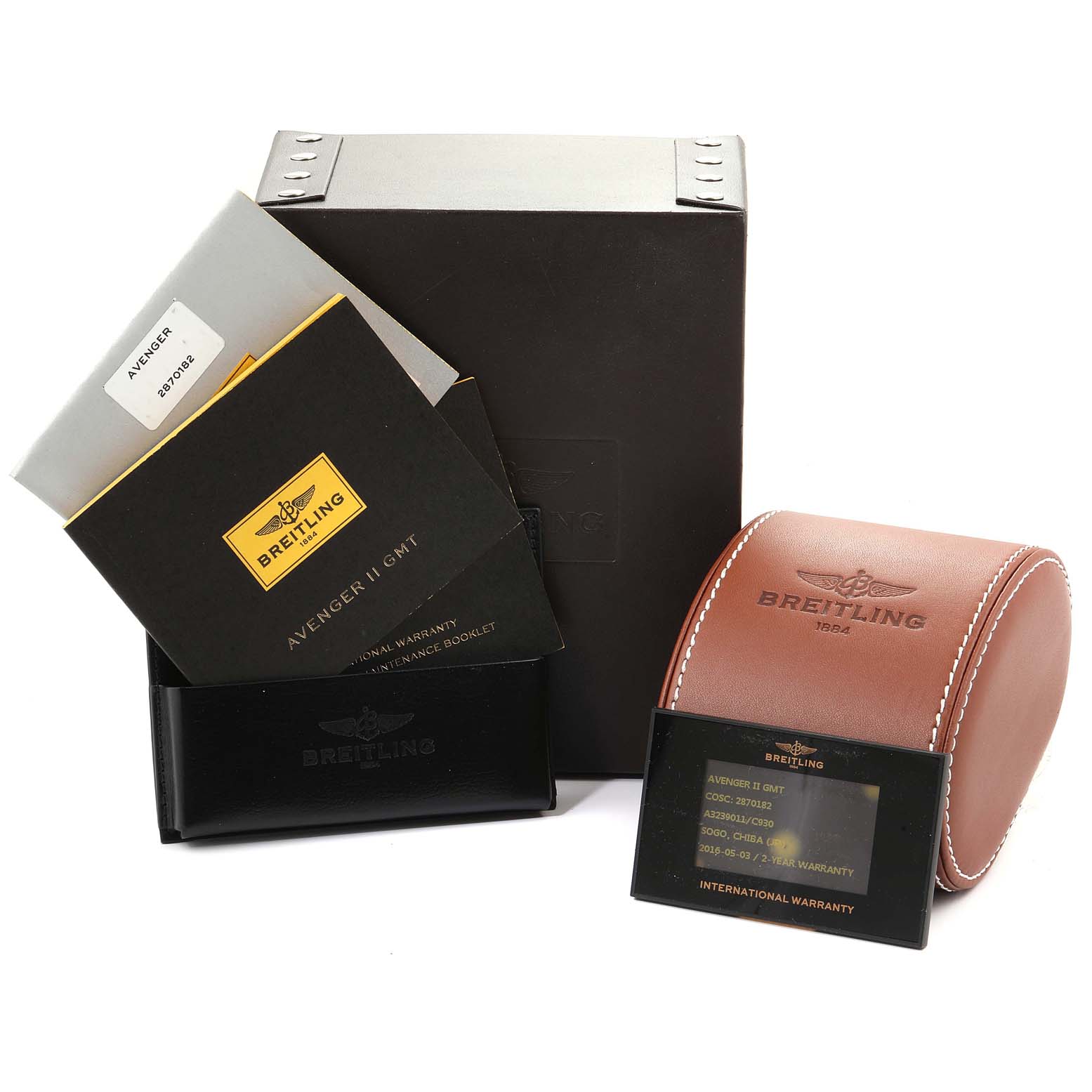 This image shows Breitling Avenger A32390 Men's Stainless Steel Blue Dial A32390 Men's Stainless Steel Blue Dial accessories, including the box, warranty card, manuals, and a leather travel case.