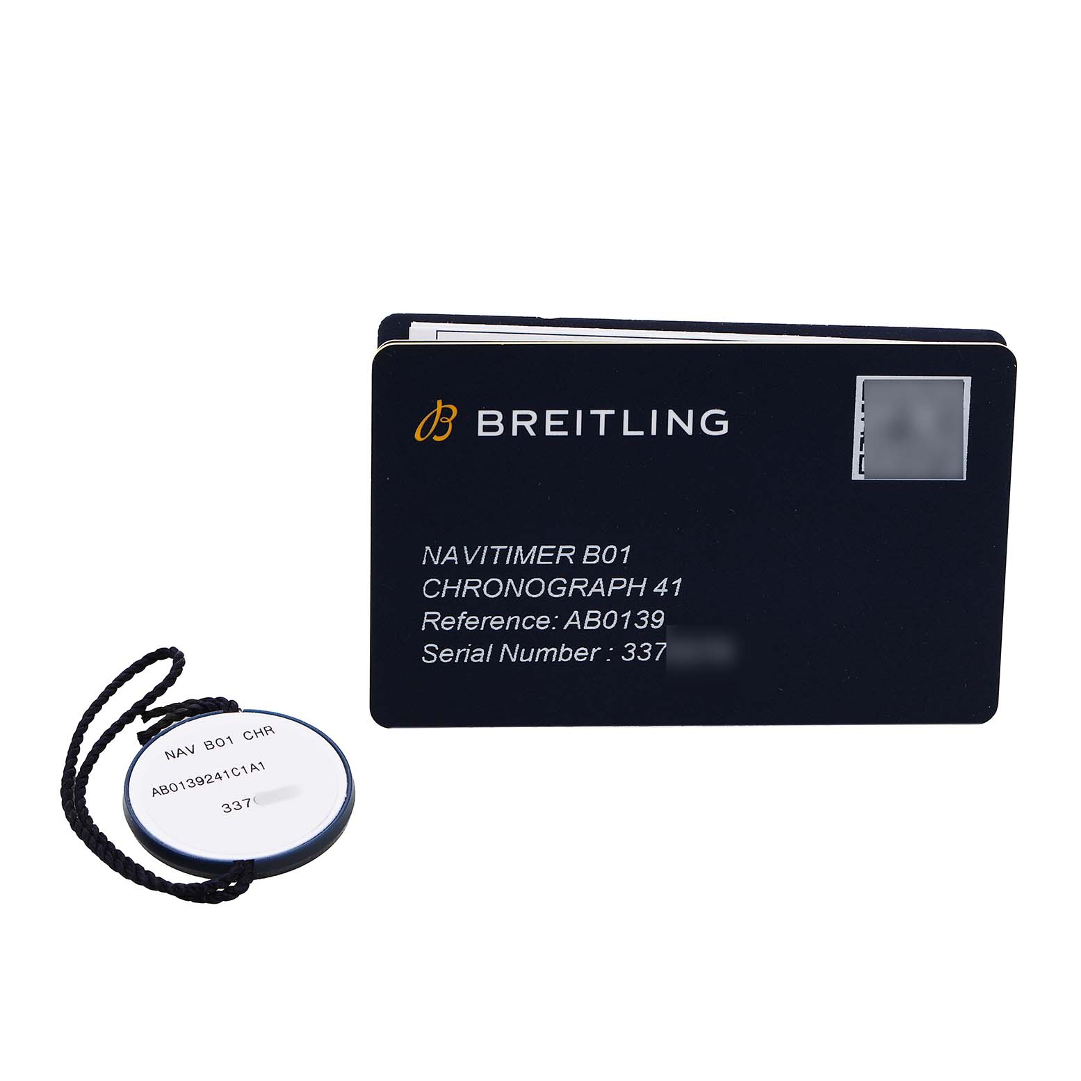 The image shows a Breitling Navitimer AB0139241C1A1 Men's Stainless Steel Blue Dial B01 Chronograph 41 warranty card and tag at a slight angle.