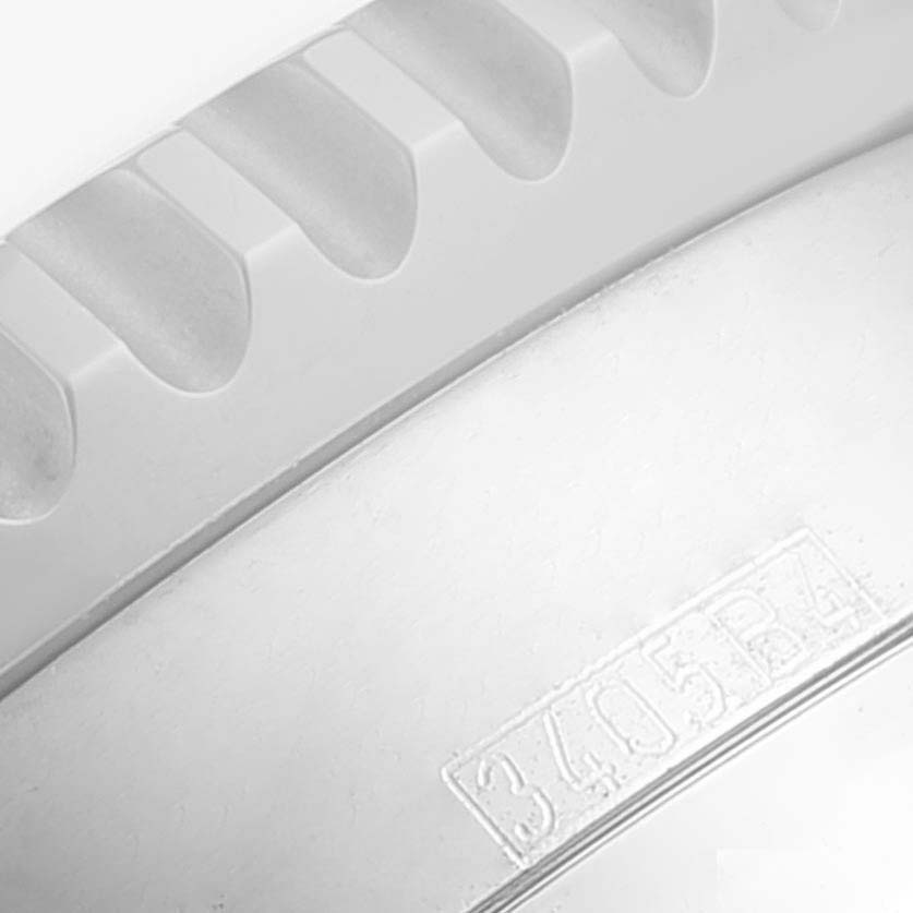 This image shows a close-up of the bezel and part of the casing of a Breitling Navitimer A24322 Men's Stainless Steel Silver Dial A24322 Men's Stainless Steel Silver Dial model.