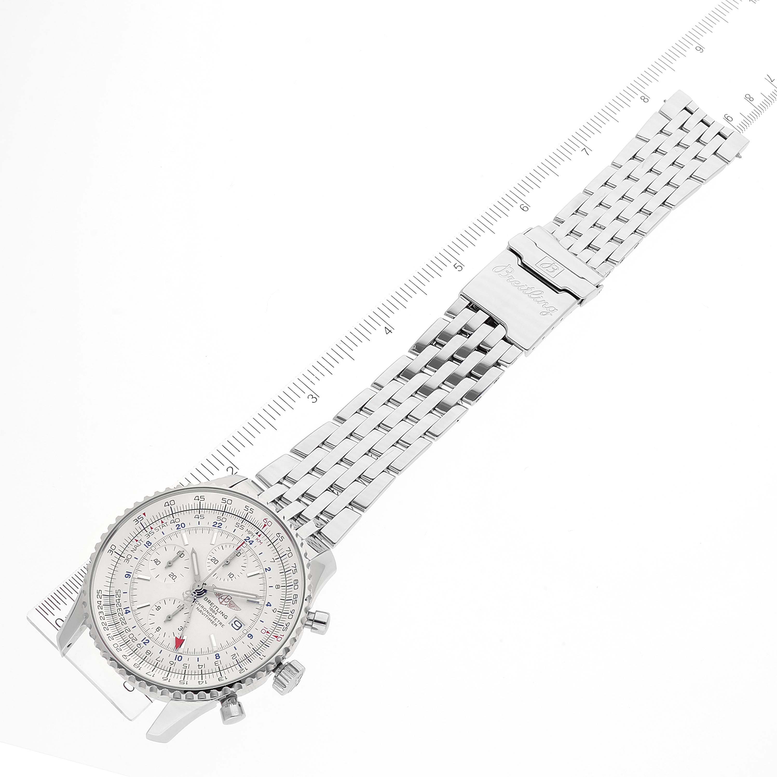 The Breitling Navitimer A24322 Men's Stainless Steel Silver Dial A24322 Men's Stainless Steel Silver Dial watch is shown from a top-down angle, displaying the face, bezel, crown, and metal bracelet with a ruler for scale.