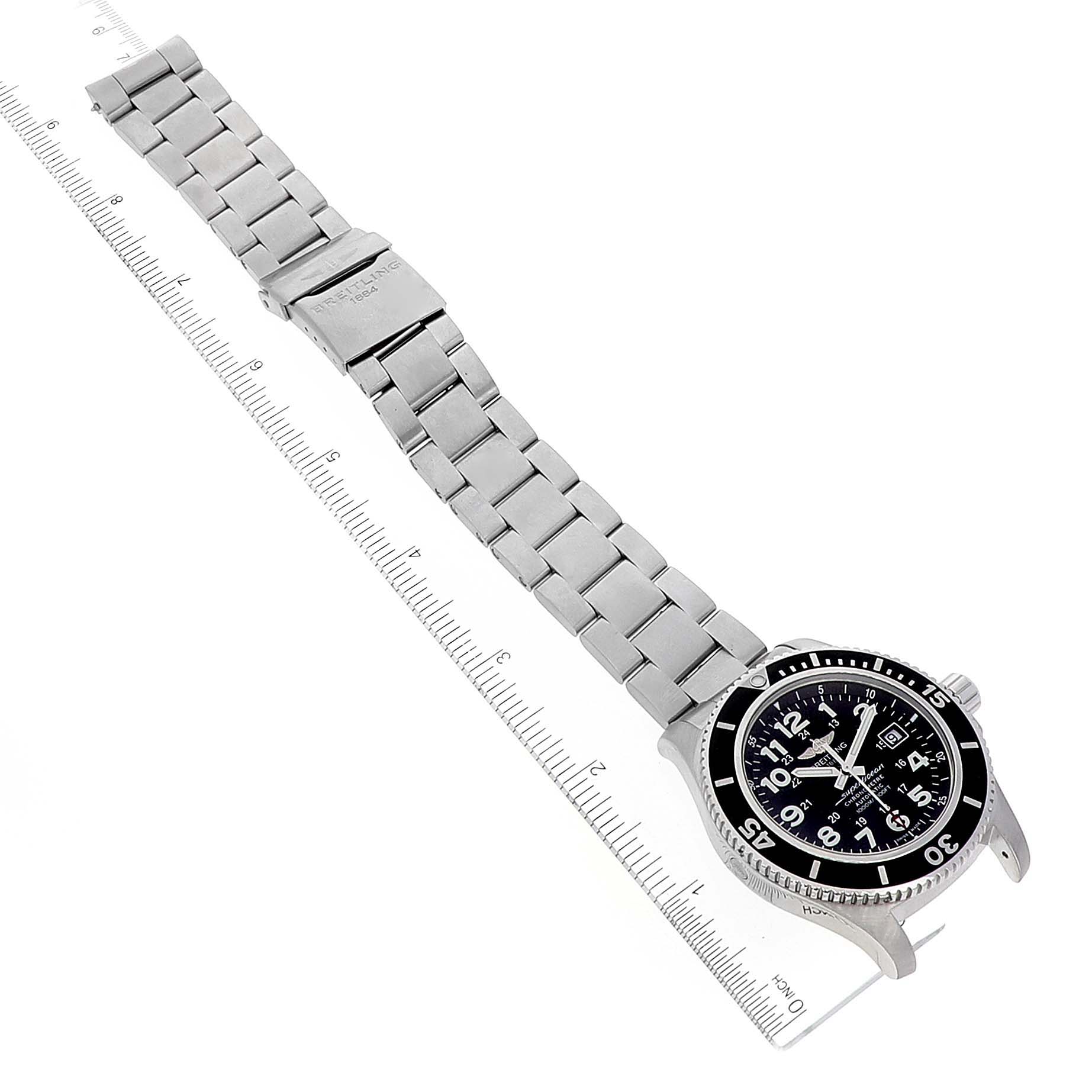 The Breitling Superocean A17392D8/C910 Men's Stainless Steel Black Dial A17392D8/C910 Men's Stainless Steel Black Dial watch is shown from an angled top view, displaying its stainless steel bracelet and black dial.
