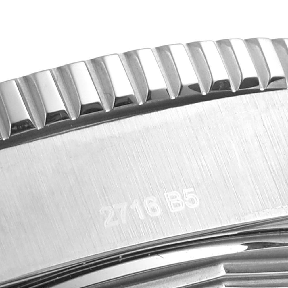 Close-up of the Breitling Superocean A17392D8/C910 Men's Stainless Steel Black Dial A17392D8/C910 Men's Stainless Steel Black Dial watch bezel, showing its ridged edge and part of its brushed metal surface.