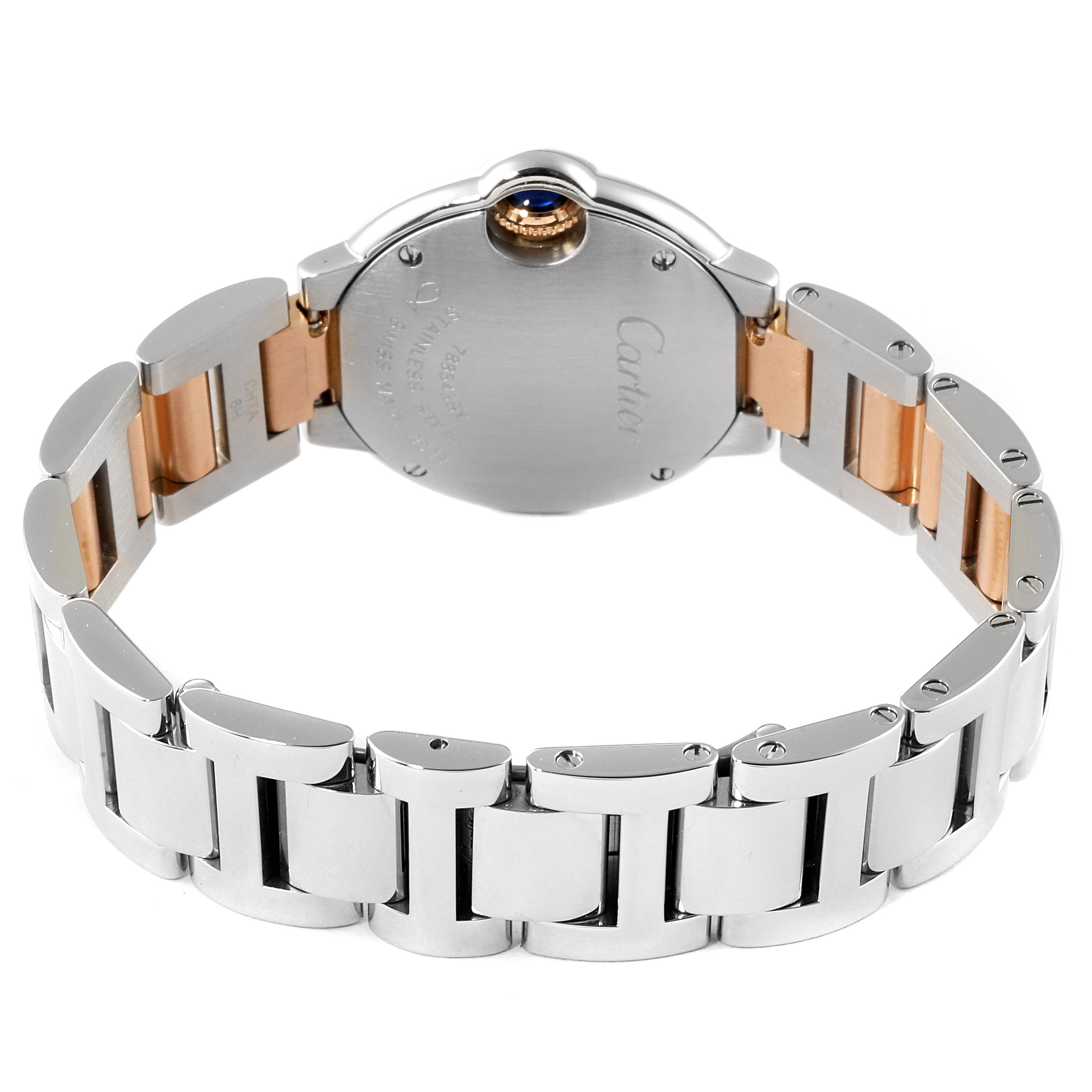 The image shows the back case and bracelet of the Cartier Ballon Bleu WE902030 Women
s Steel and Gold (two tone) Silver Dial WE902030 Women
s Steel and Gold (two tone) Silver Dial model.