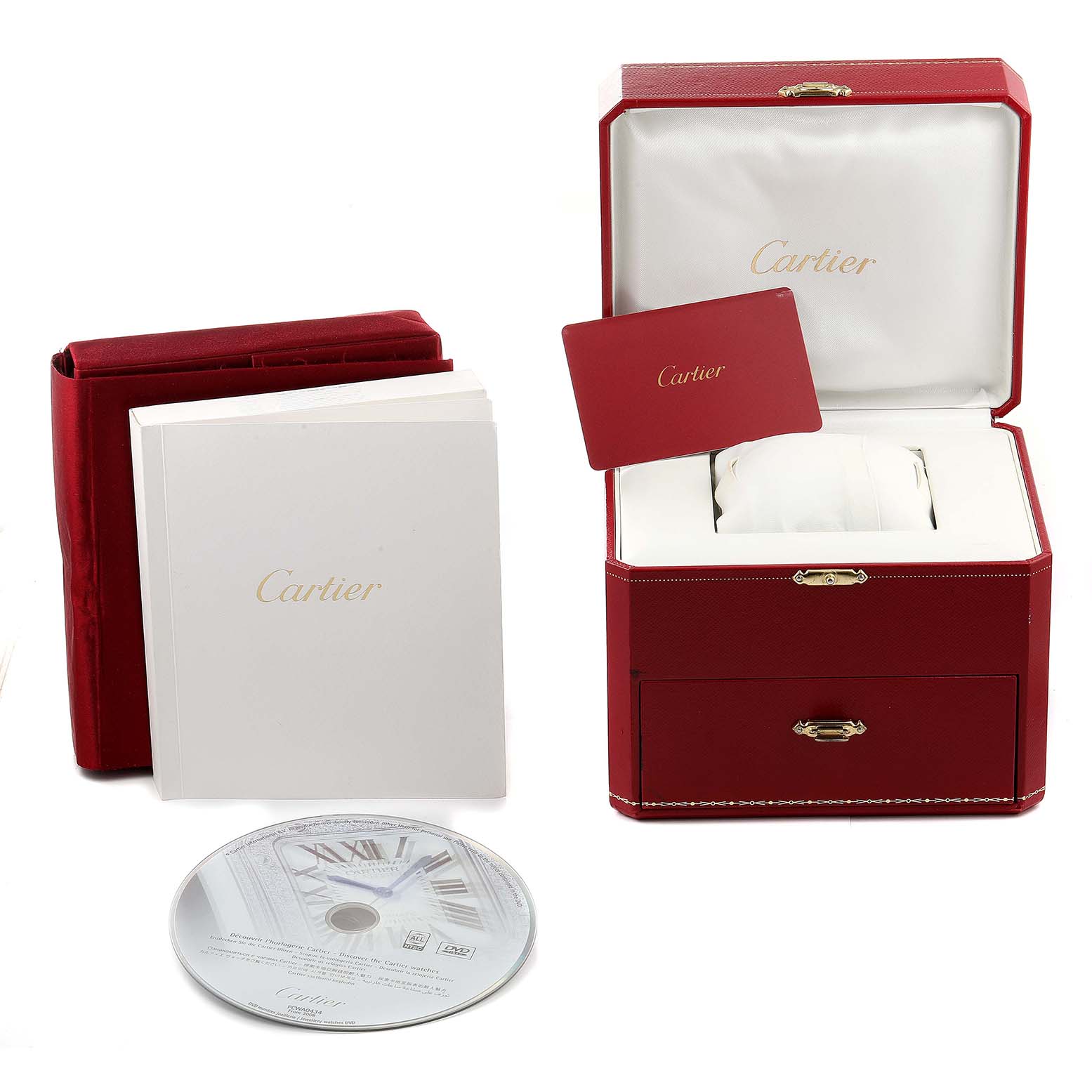 The image shows the packaging and accessories for the Drive de Cartier watch by Cartier, including the watch box, booklets, and a CD.