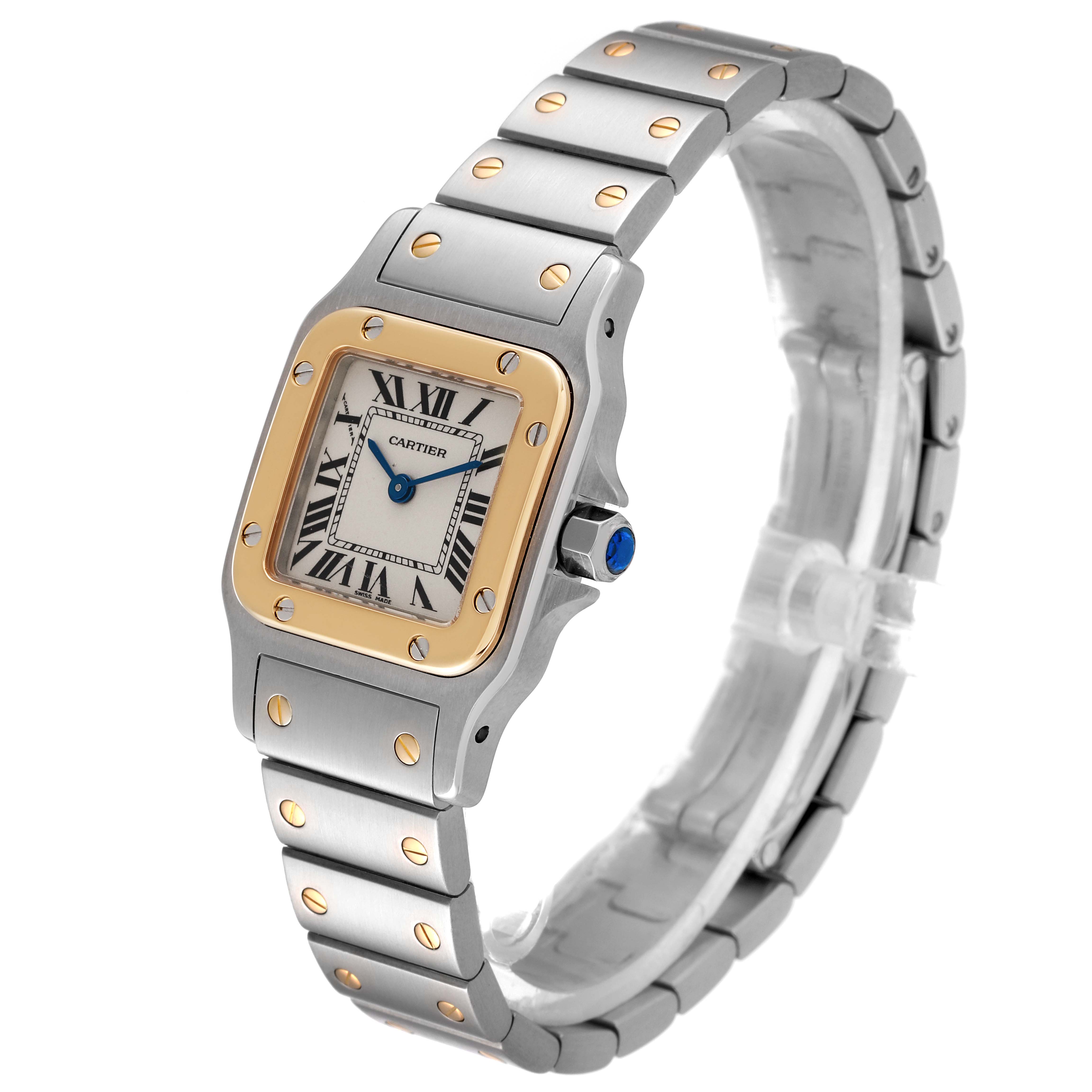 The Cartier Santos W20012C4 Women's Steel and Gold (two tone) Silver Dial W20012C4 Women's Steel and Gold (two tone) Silver Dial watch in the image is shown at an angle displaying the dial, bezel, and bracelet.