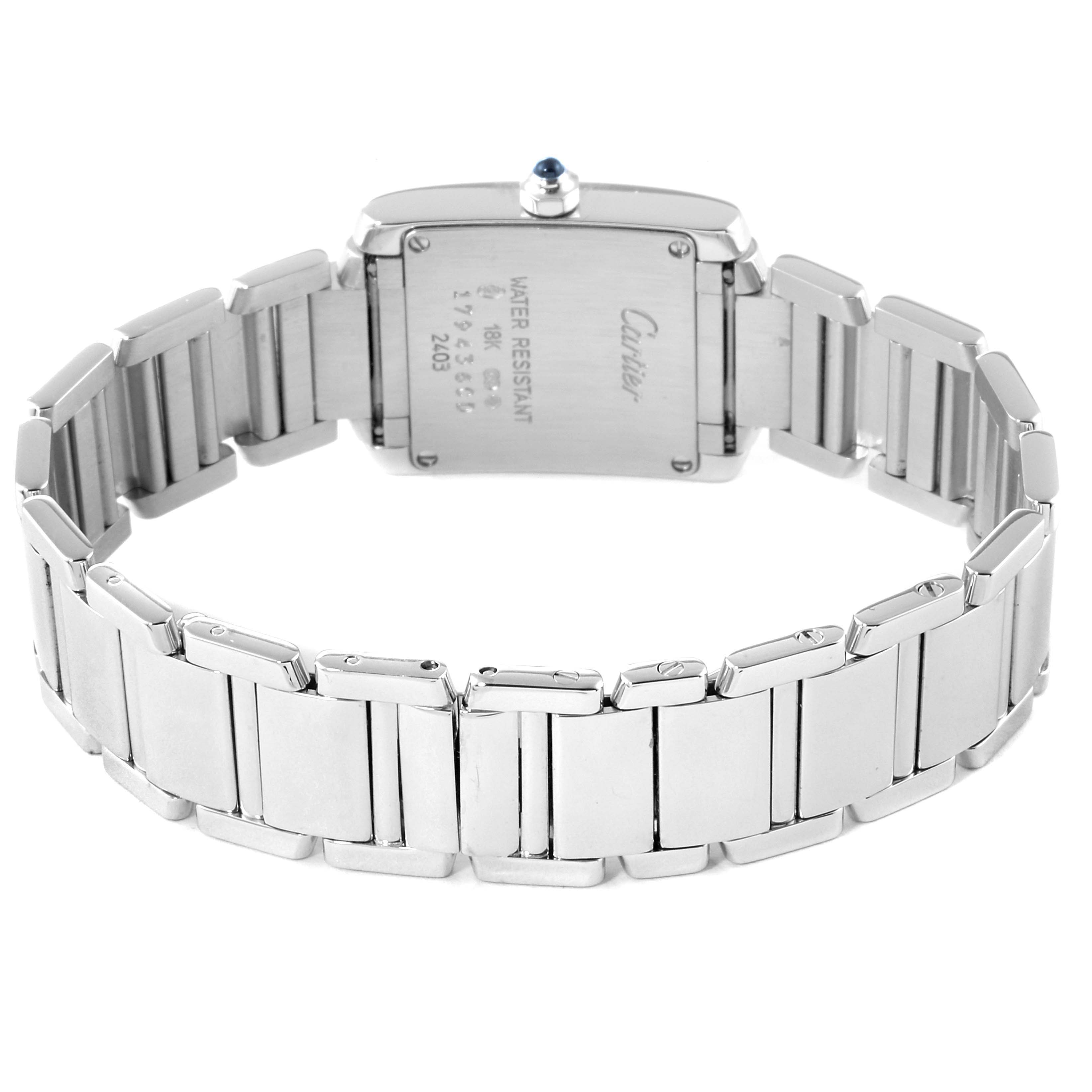 The image shows the back view of the Cartier Tank Francaise W50012S3 Women's White Gold Silver Dial W50012S3 Women's White Gold Silver Dial watch, highlighting its bracelet and caseback details.