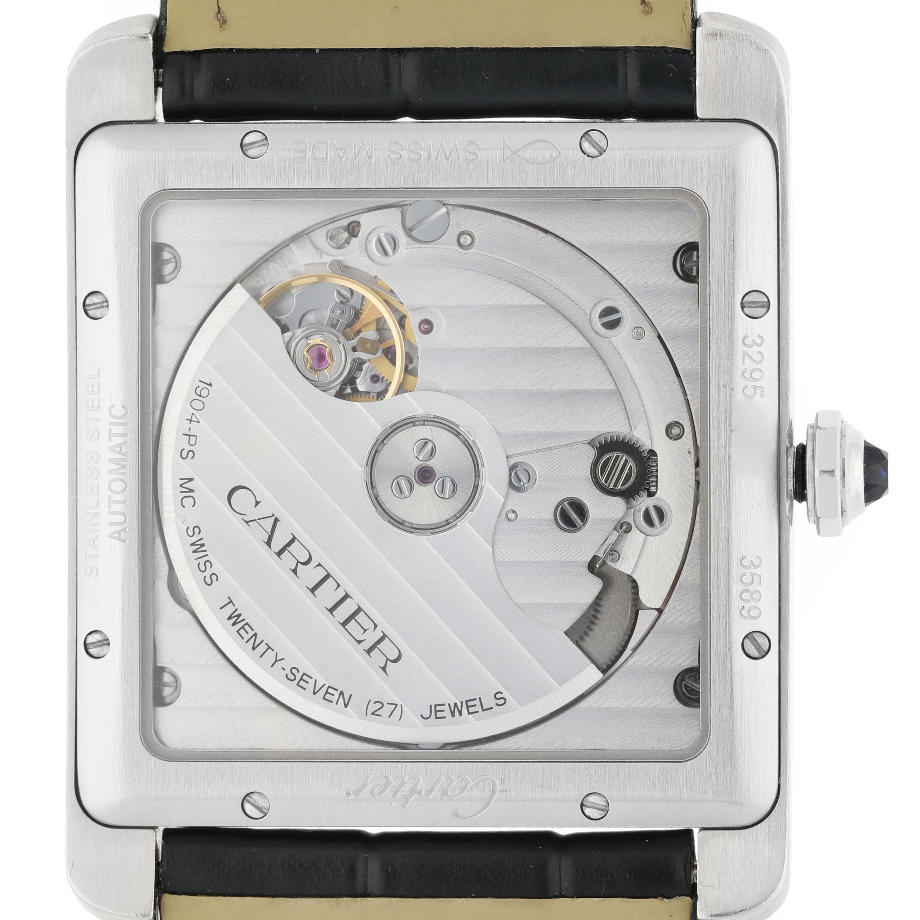 The image shows the back view of a Cartier Tank MC W5330003 Men's Stainless Steel Silver Dial model, highlighting its automatic movement and inner workings.