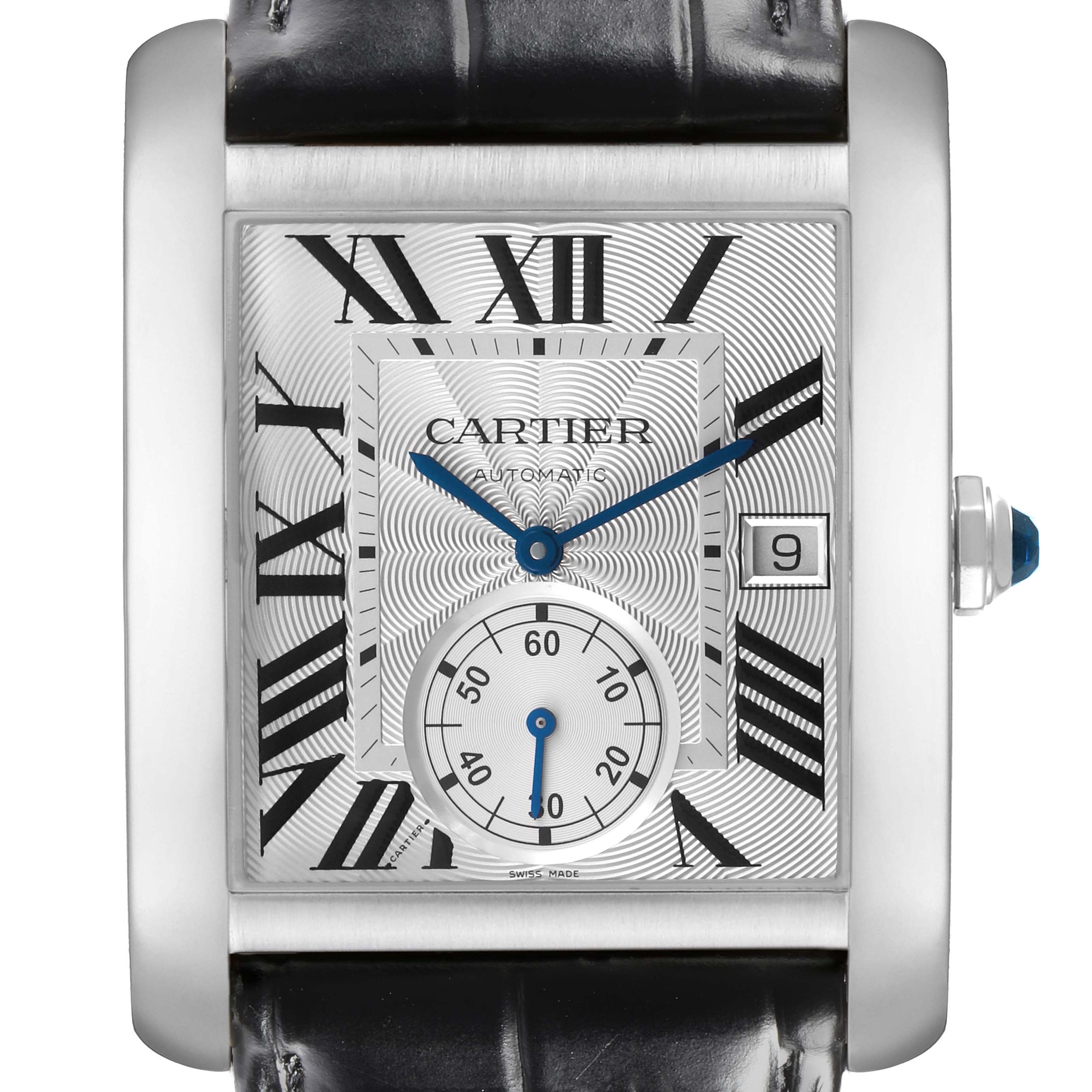 The Cartier Tank MC W5330003 Men's Stainless Steel Silver Dial watch is shown from the front, featuring its rectangular dial with Roman numerals, blue hands, and date window.