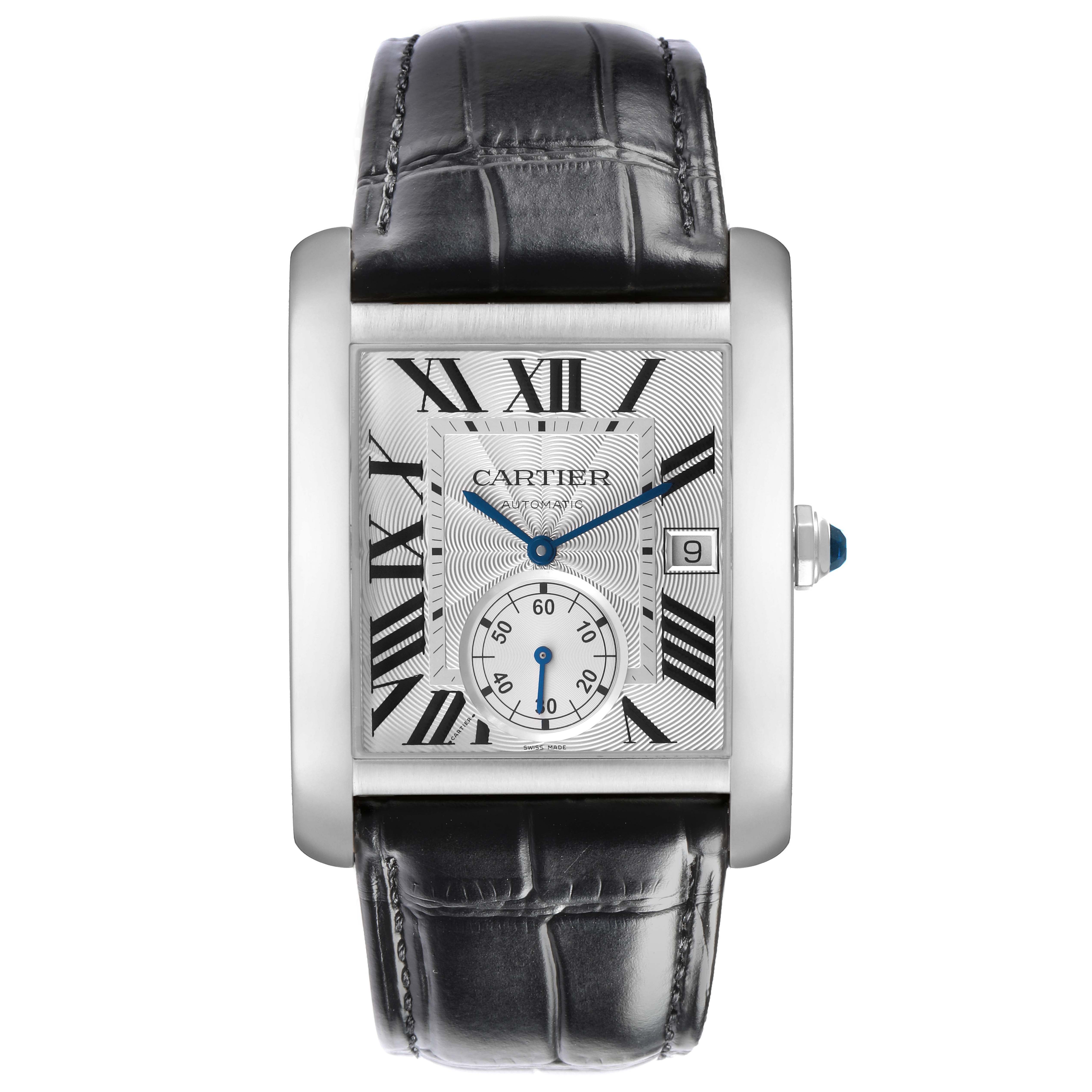 The Cartier Tank MC W5330003 Men's Stainless Steel Silver Dial watch is shown from a front angle, highlighting its rectangular face, Roman numerals, blue hands, and leather strap.