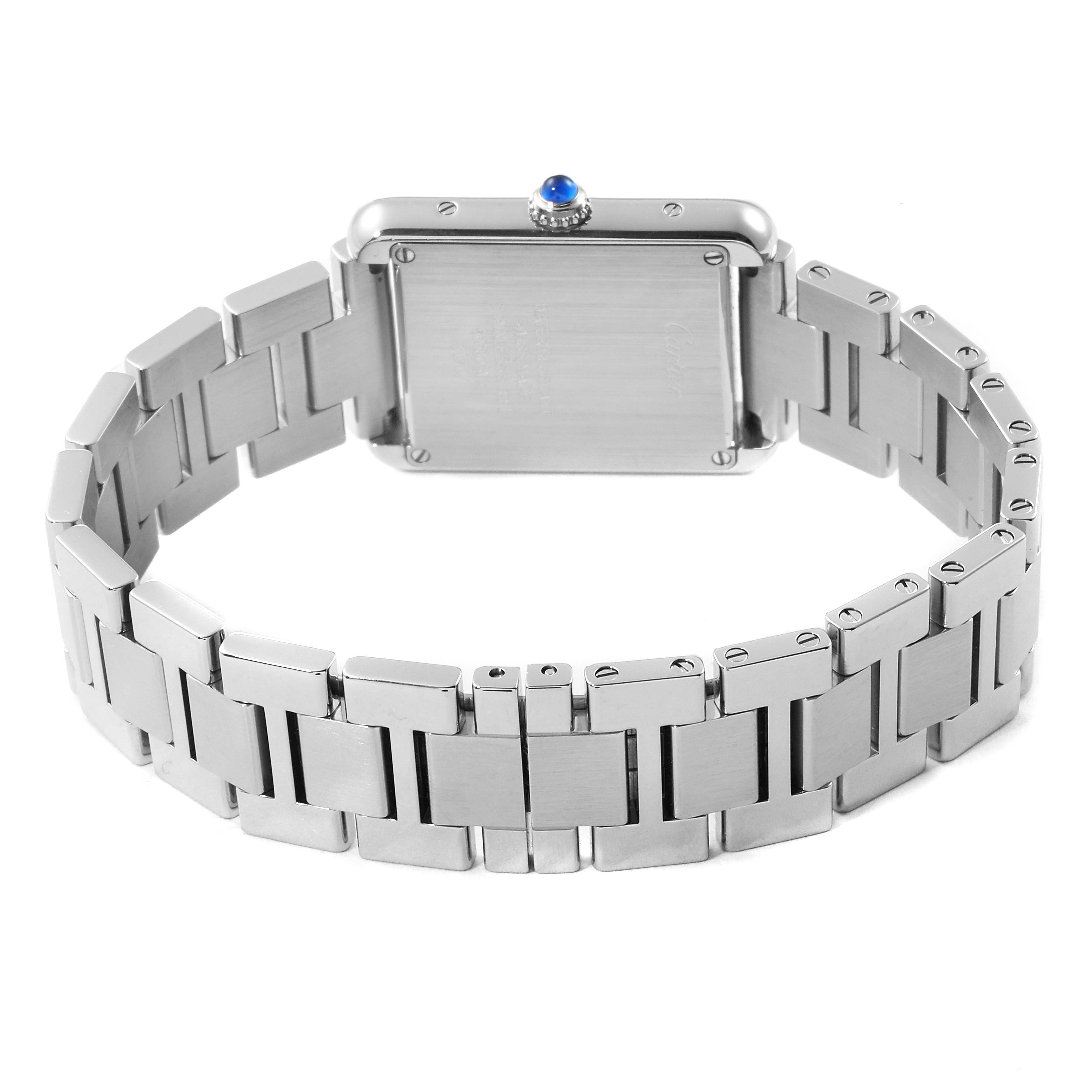The image shows the back of the Cartier Tank Solo W5200013 Women's Stainless Steel Silver Dial W5200013 Women's Stainless Steel Silver Dial watch, highlighting its metal bracelet and case.