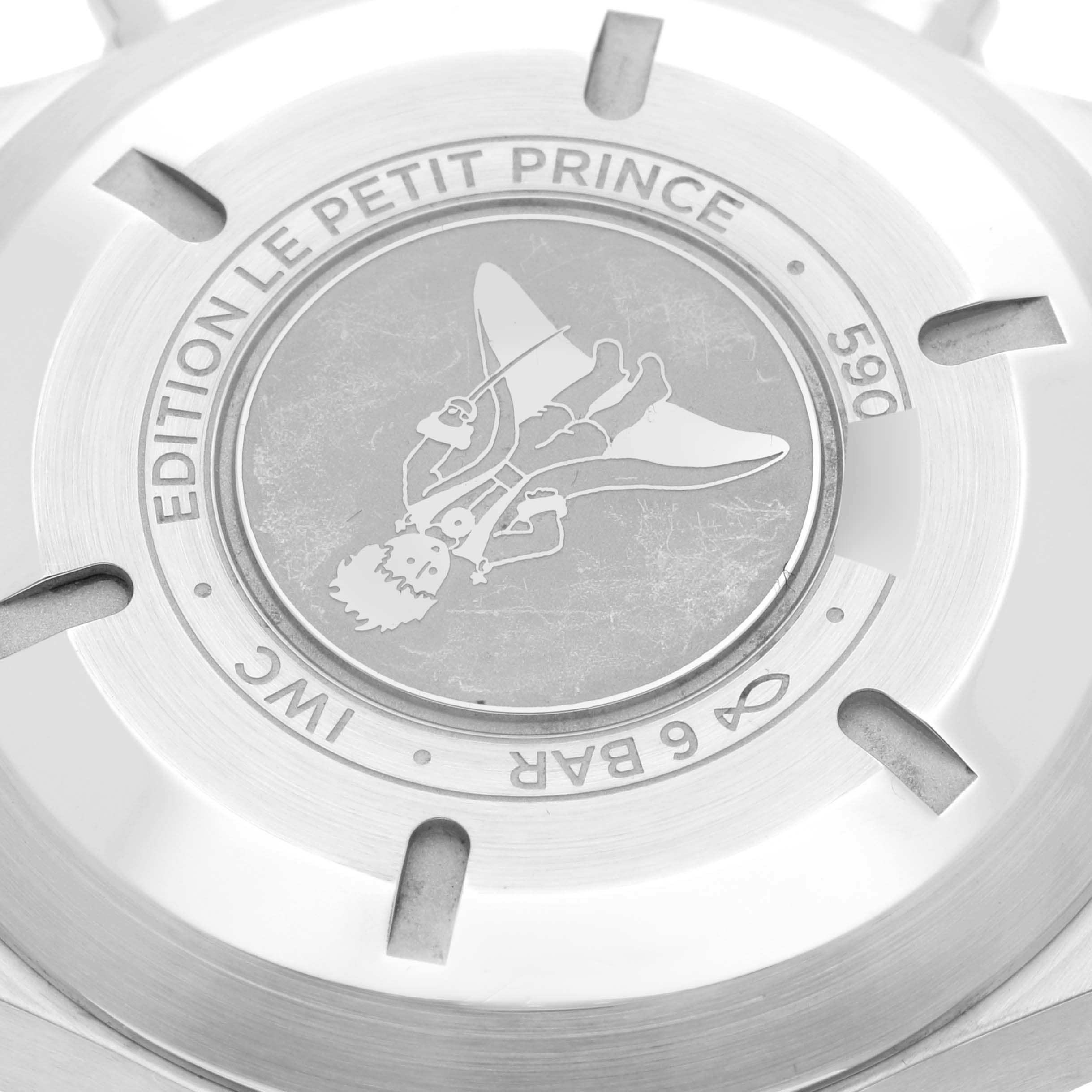 The image shows the back case of the IWC Pilot IW377717 Men's Stainless Steel Blue Dial IW377717 Men's Stainless Steel Blue Dial model watch, displaying the "Edition Le Petit Prince" engraving.