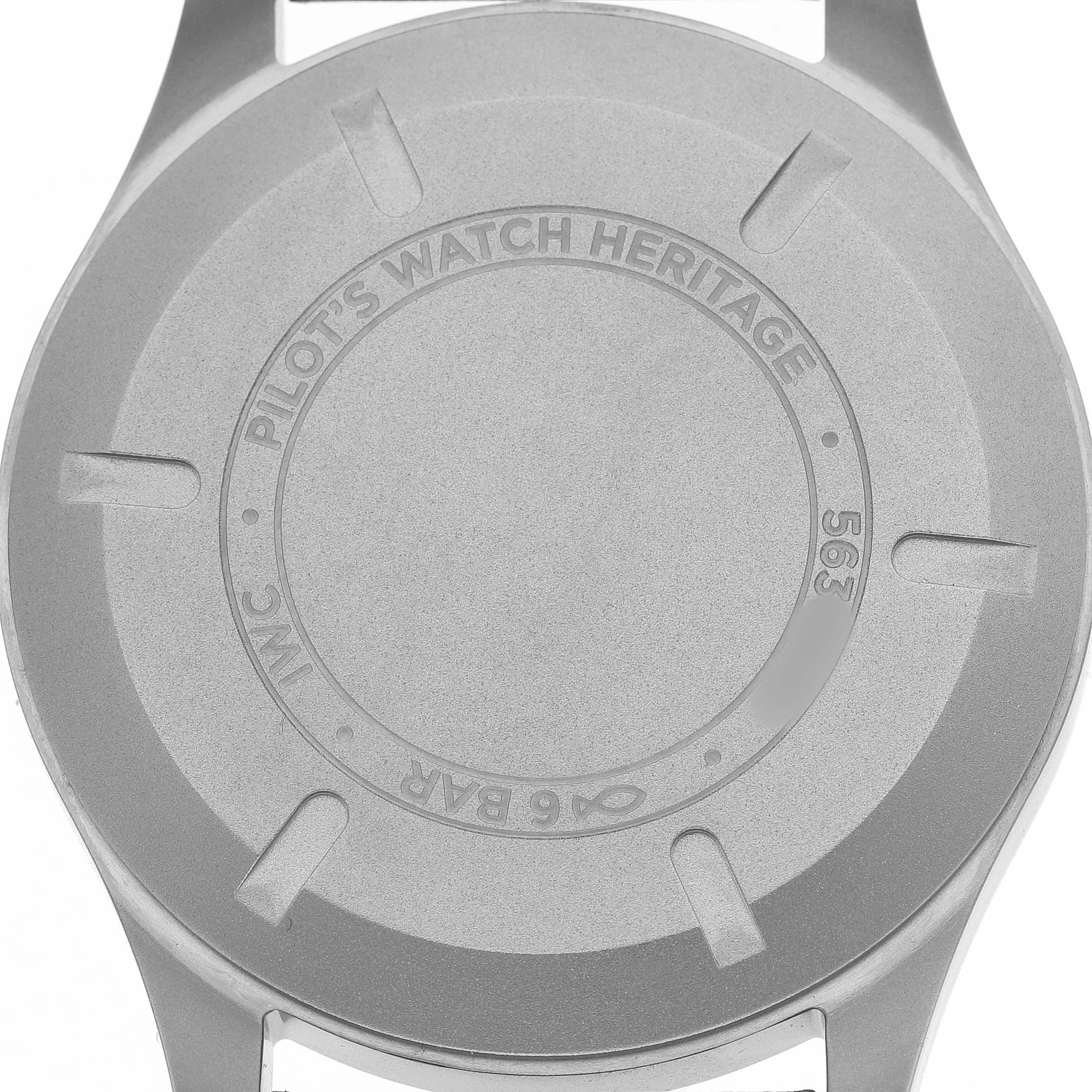 This image shows the back casing of an IWC Pilot IW327006 Men's Titanium Black Dial's Watch Heritage model.