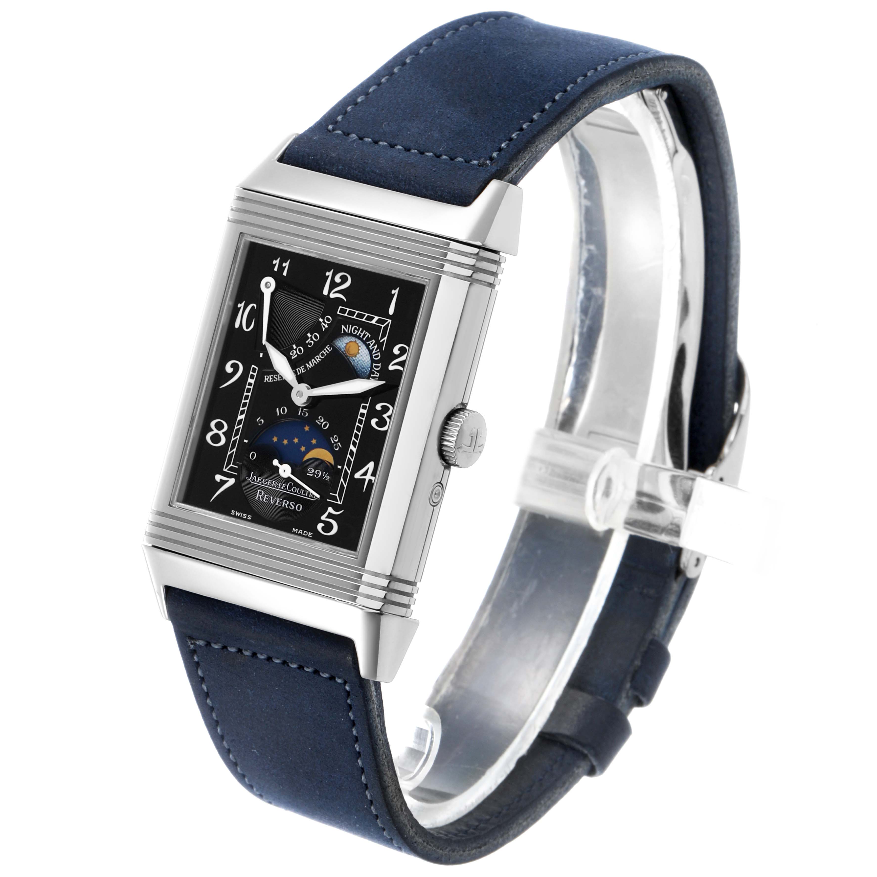 The Jaeger-LeCoultre Reverso watch is shown at a three-quarter angle, displaying the face, case, and blue leather strap.