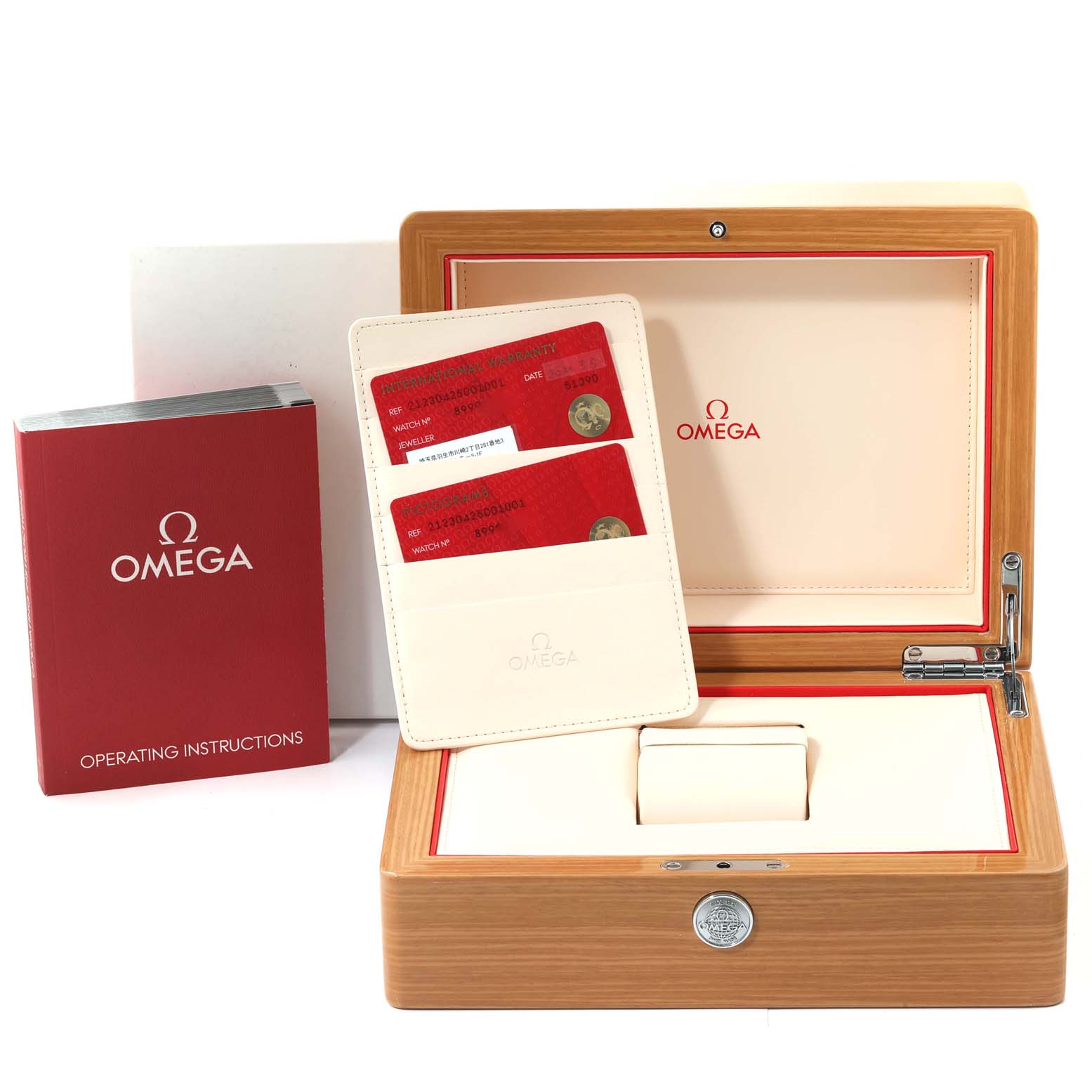 The image shows the Omega Seamaster 212.30.42.50.01.001 Men
s Stainless Steel Black Dial 212.30.42.50.01.001 Men
s Stainless Steel Black Dial watch accessories, including the wooden box, operating instructions, and warranty cards.