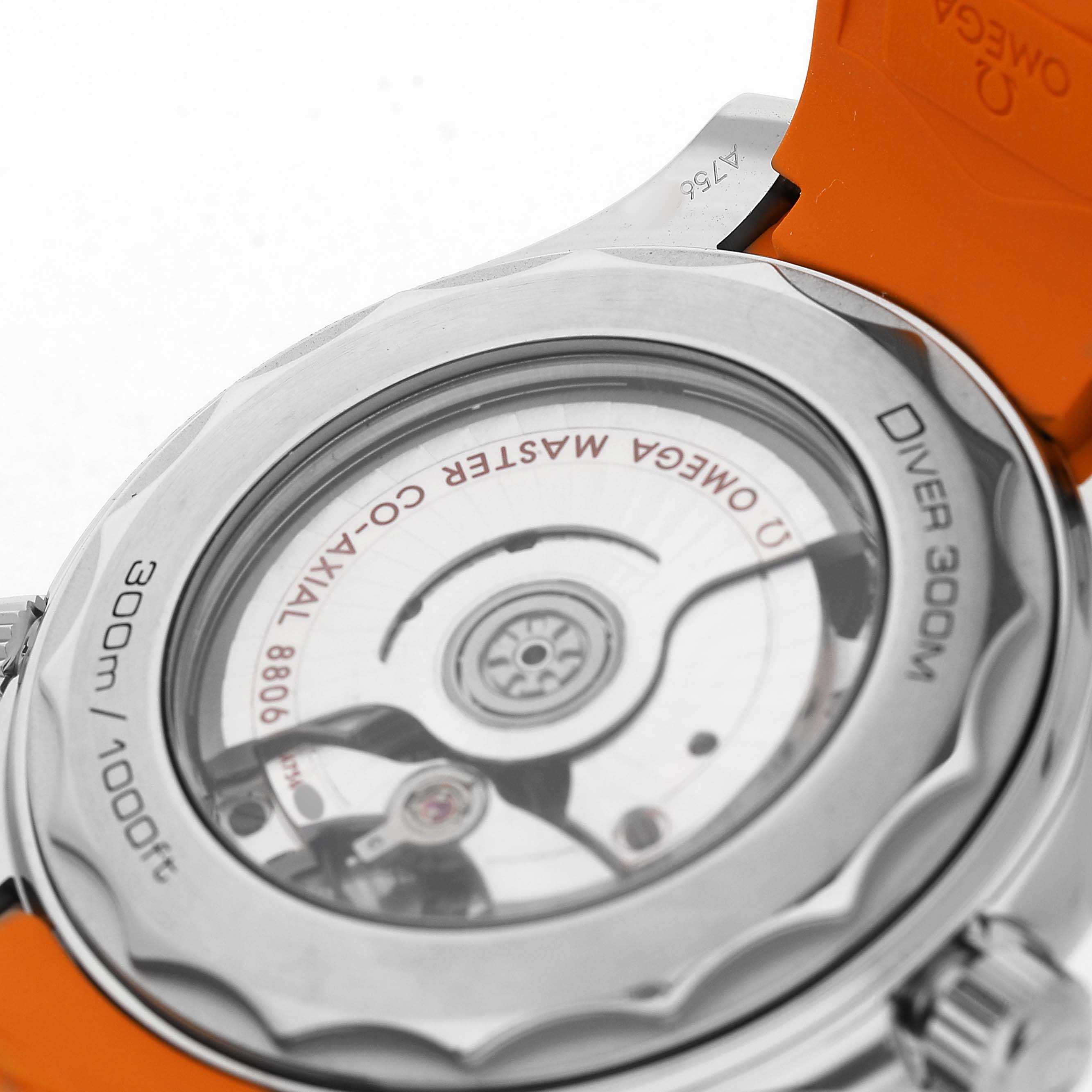 The image shows the case back of an Omega Seamaster 210.32.42.20.01.006 Men's Stainless Steel Black Dial watch, displaying its movement and the "Diver 300M" engraving.