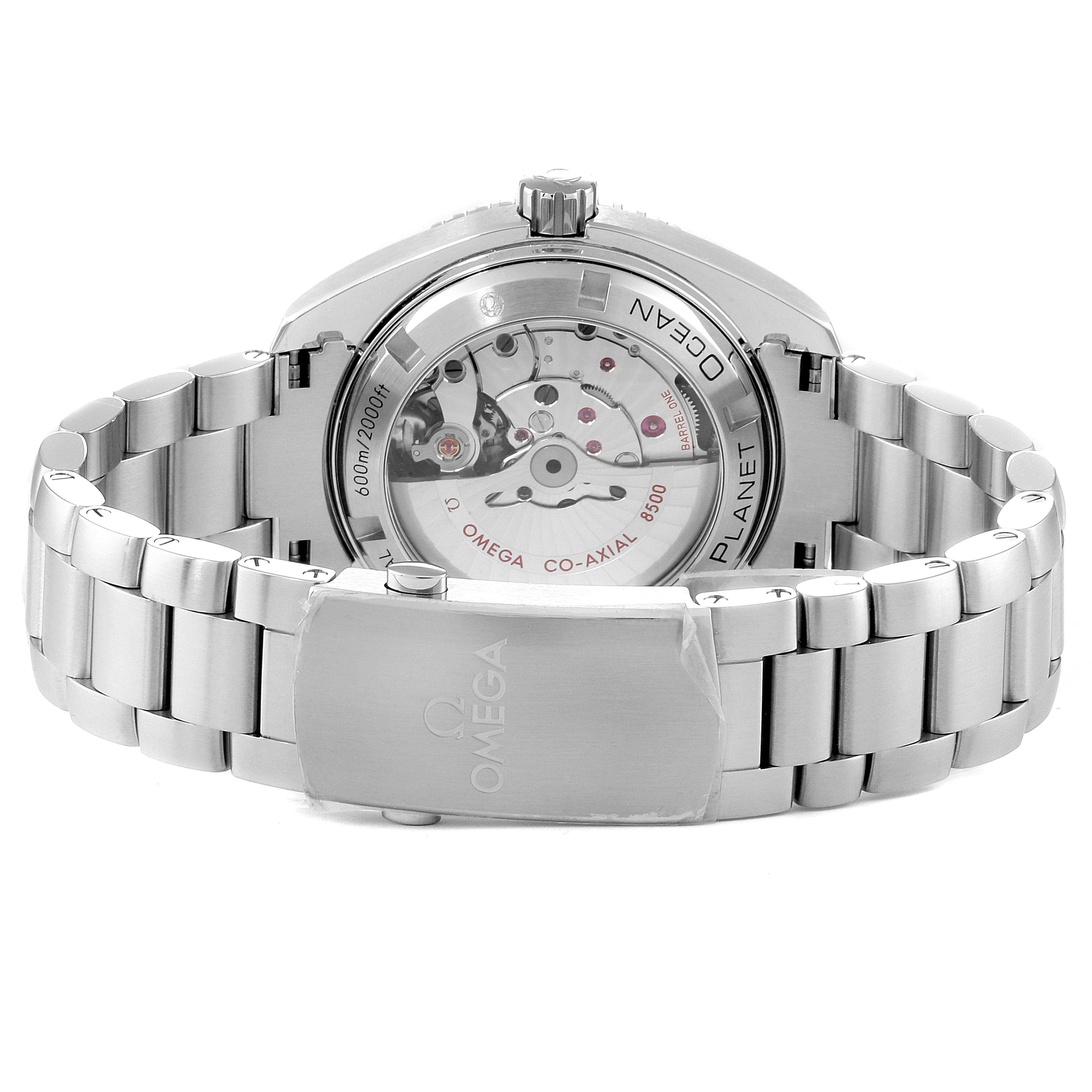 The image shows the back view of an Omega Planet Ocean 232.30.42.21.01.003 Men
s Stainless Steel Black Dial 232.30.42.21.01.003 Men
s Stainless Steel Black Dial watch, focusing on the open case back and metal bracelet.