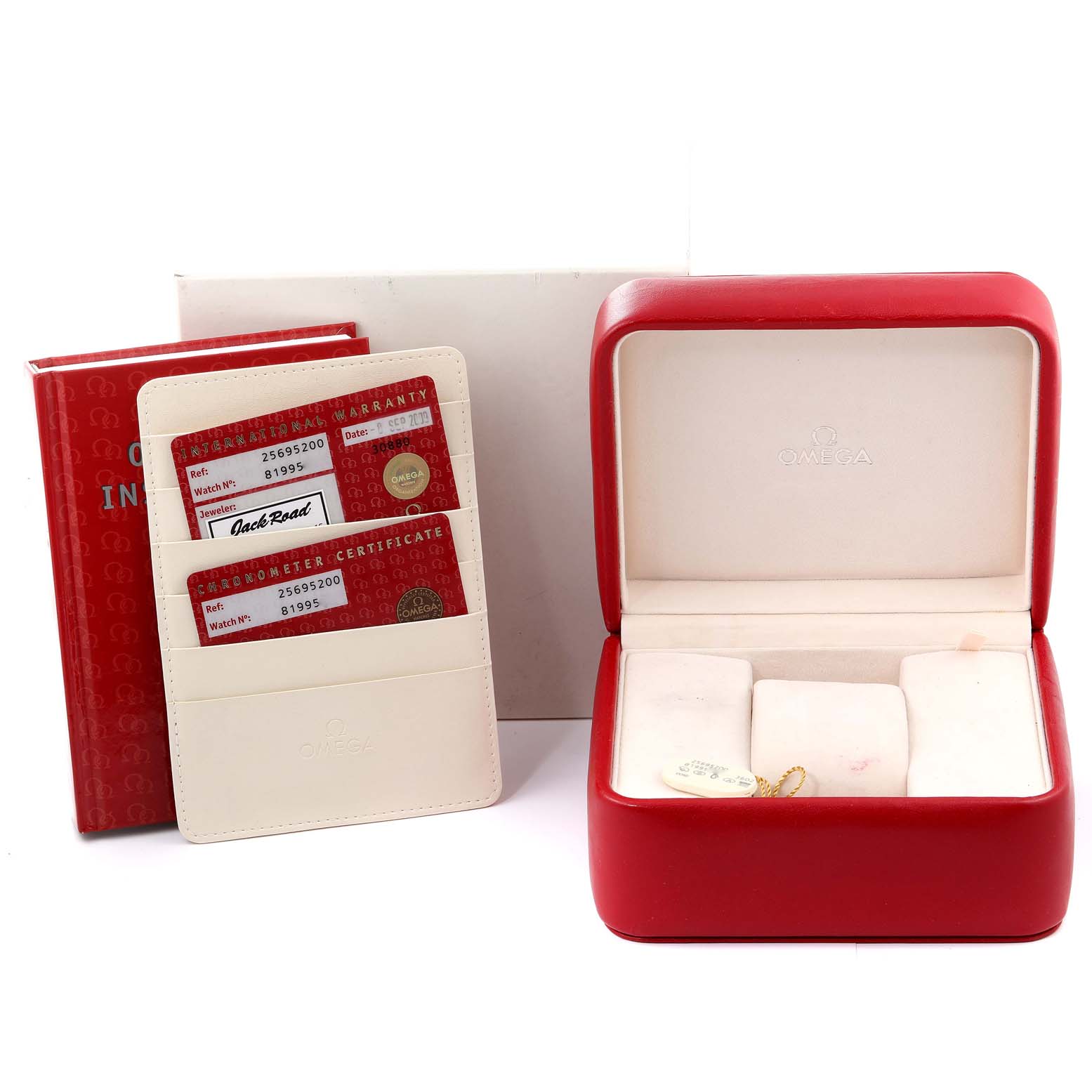 The image shows the packaging, warranty cards, and certificates for the Omega Seamaster 2569.52.00 Men's Stainless Steel Black Dial 2569.52.00 Men's Stainless Steel Black Dial, including the watch box and documentation.