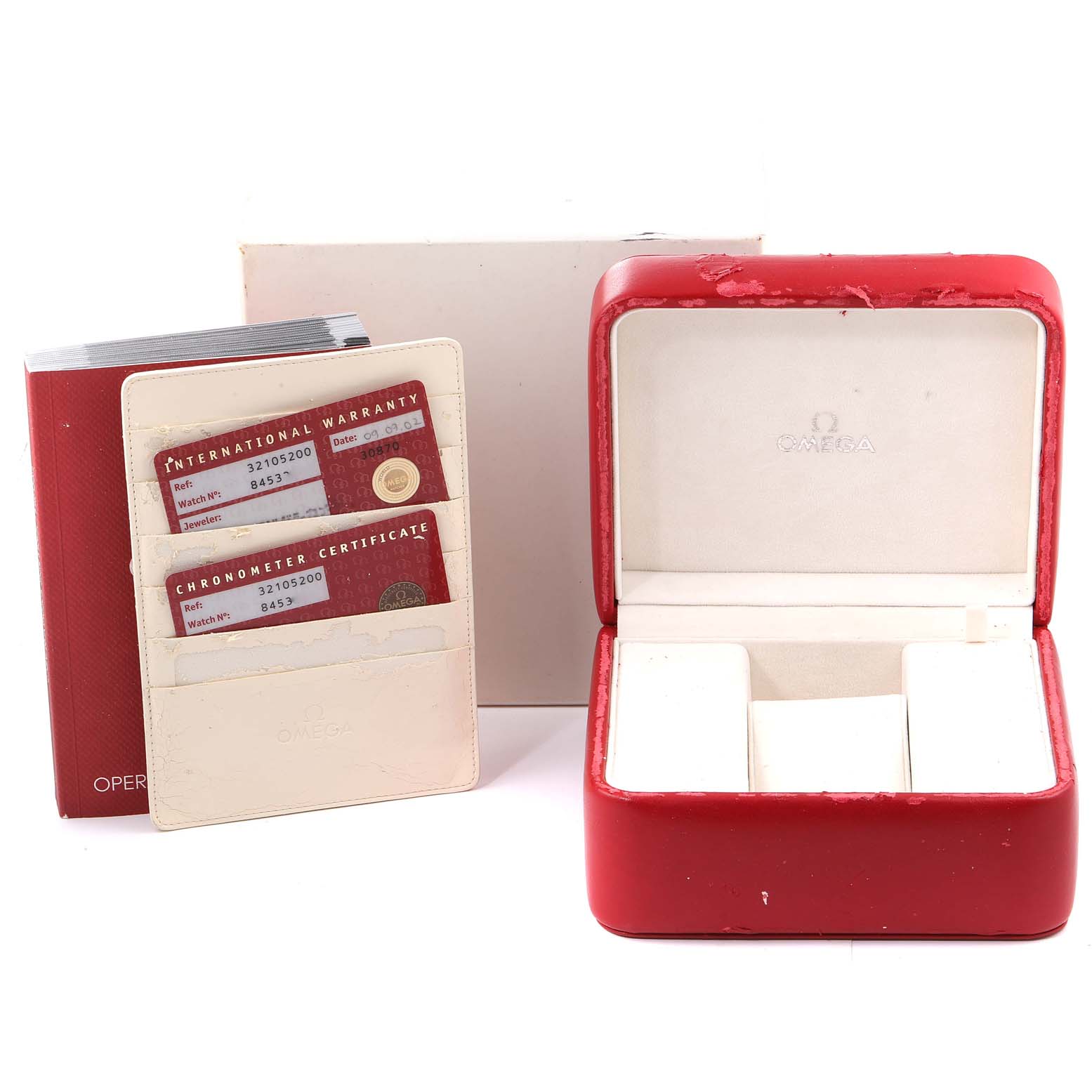 The image shows an Omega Speedmaster 3210.52.00 Men
s Stainless Steel Black Dial 3210.52.00 Men
s Stainless Steel Black Dial watch box, warranty cards, and a certificate holder.