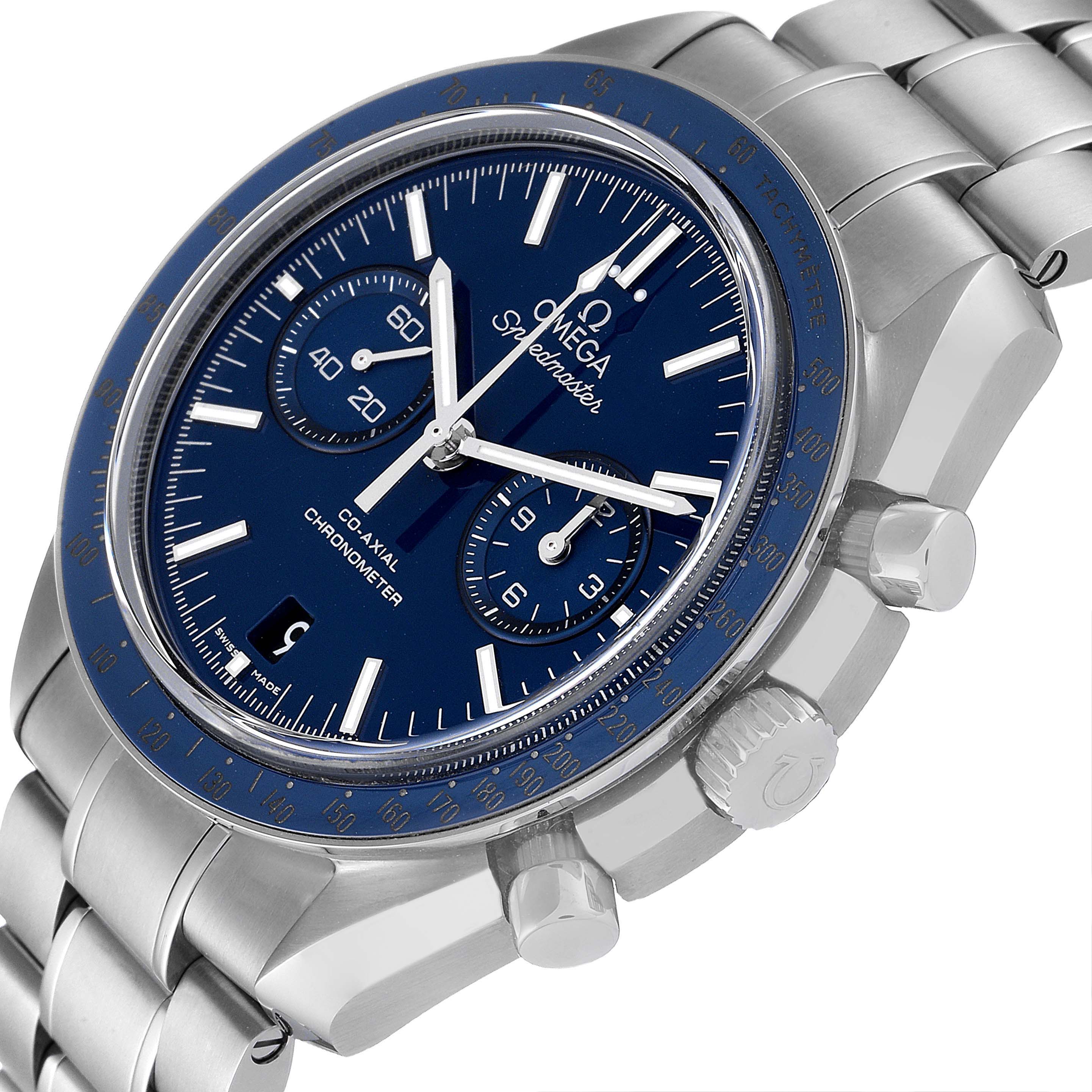The Omega Speedmaster 311.90.44.51.03.001 Men's Titanium Blue Dial 311.90.44.51.03.001 Men's Titanium Blue Dial watch is shown at an angled side view, highlighting its dial, bezel, pushers, and bracelet.