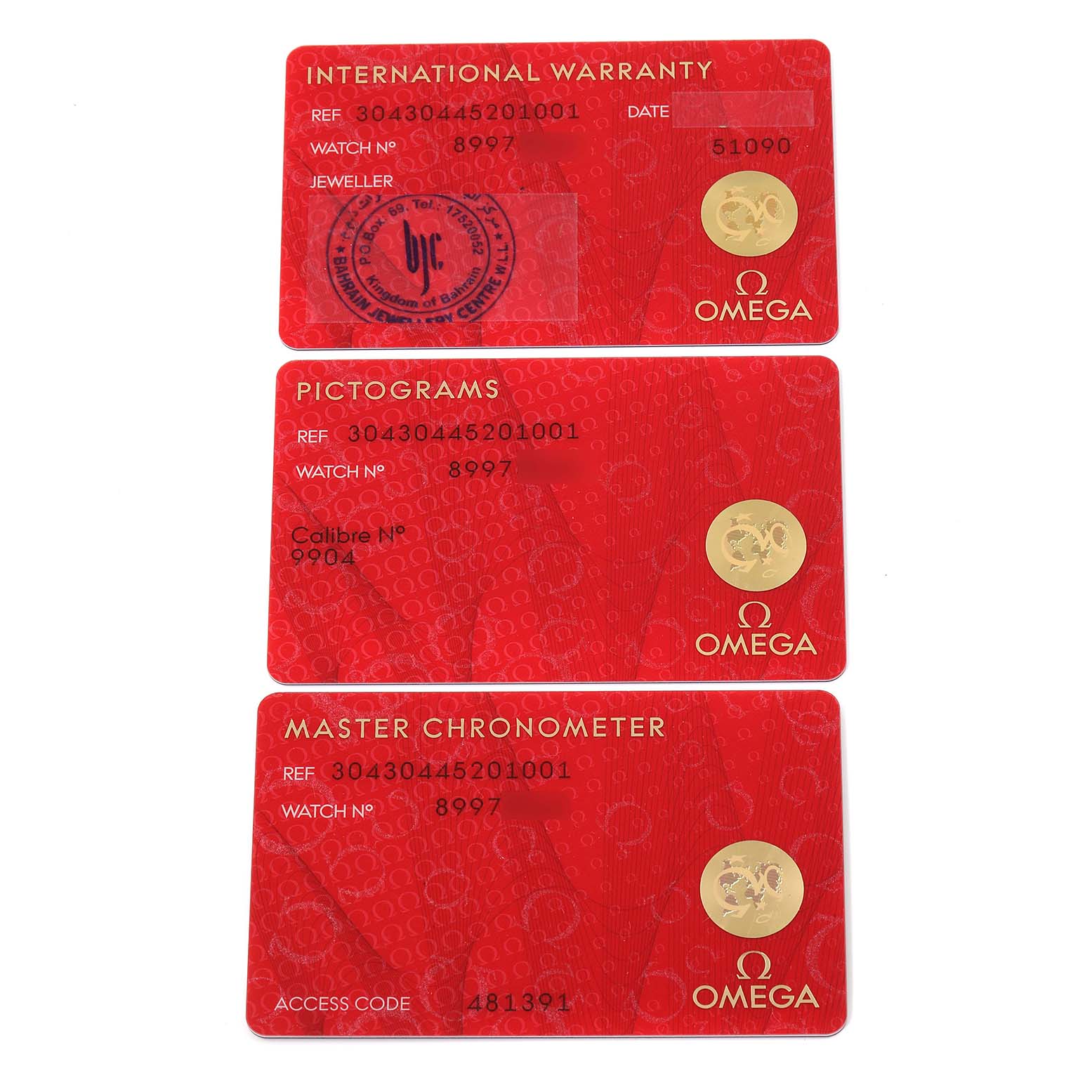 The image shows three red Omega Speedmaster 304.30.44.52.01.001 Men's Stainless Steel Black Dial 304.30.44.52.01.001 Men's Stainless Steel Black Dial cards: International Warranty, Pictograms, and Master Chronometer.