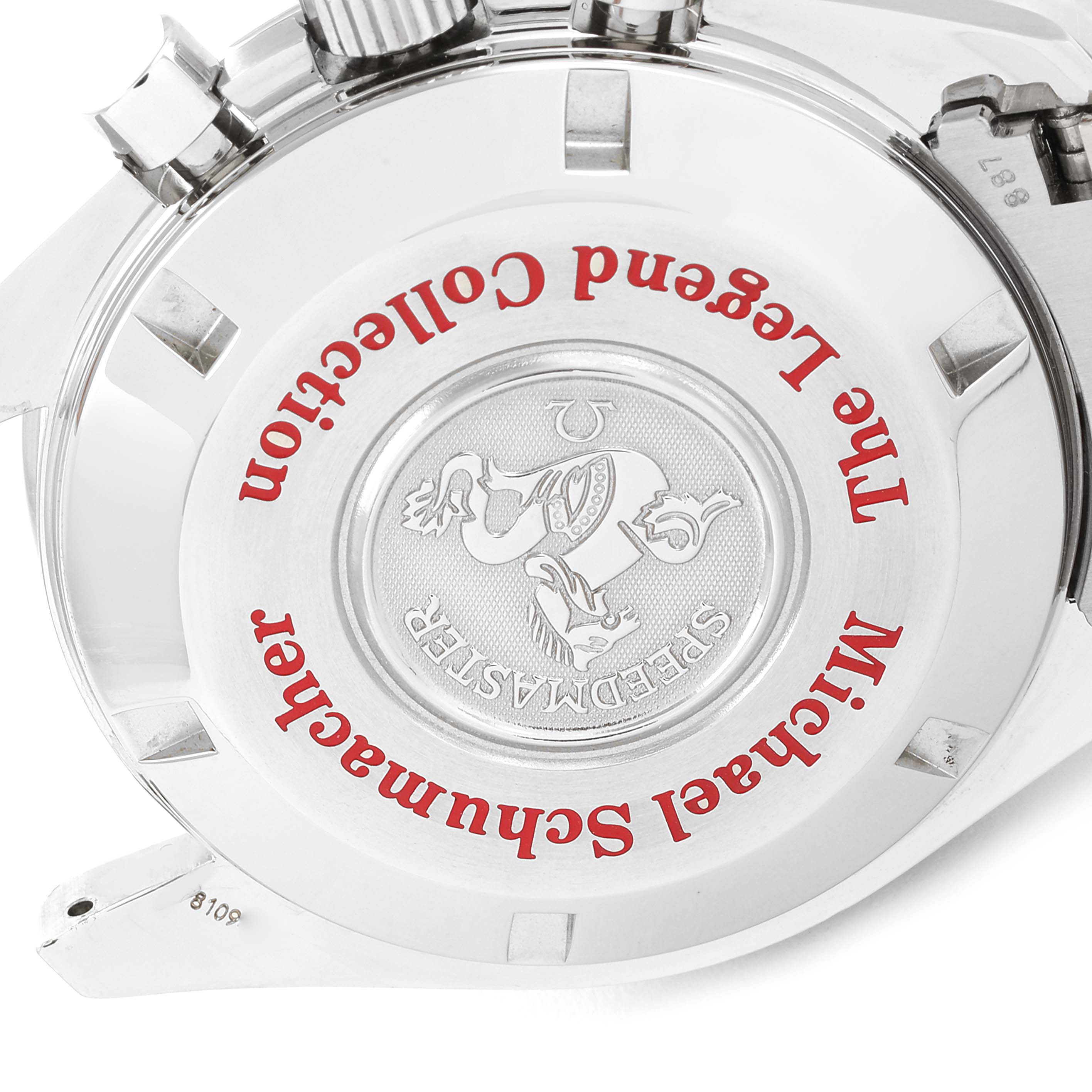 This image shows the back case of an Omega Speedmaster 3507.51.00 Men's Stainless Steel Black Dial 3507.51.00 Men's Stainless Steel Black Dial watch from a close-up angle, highlighting the engraved and printed details.