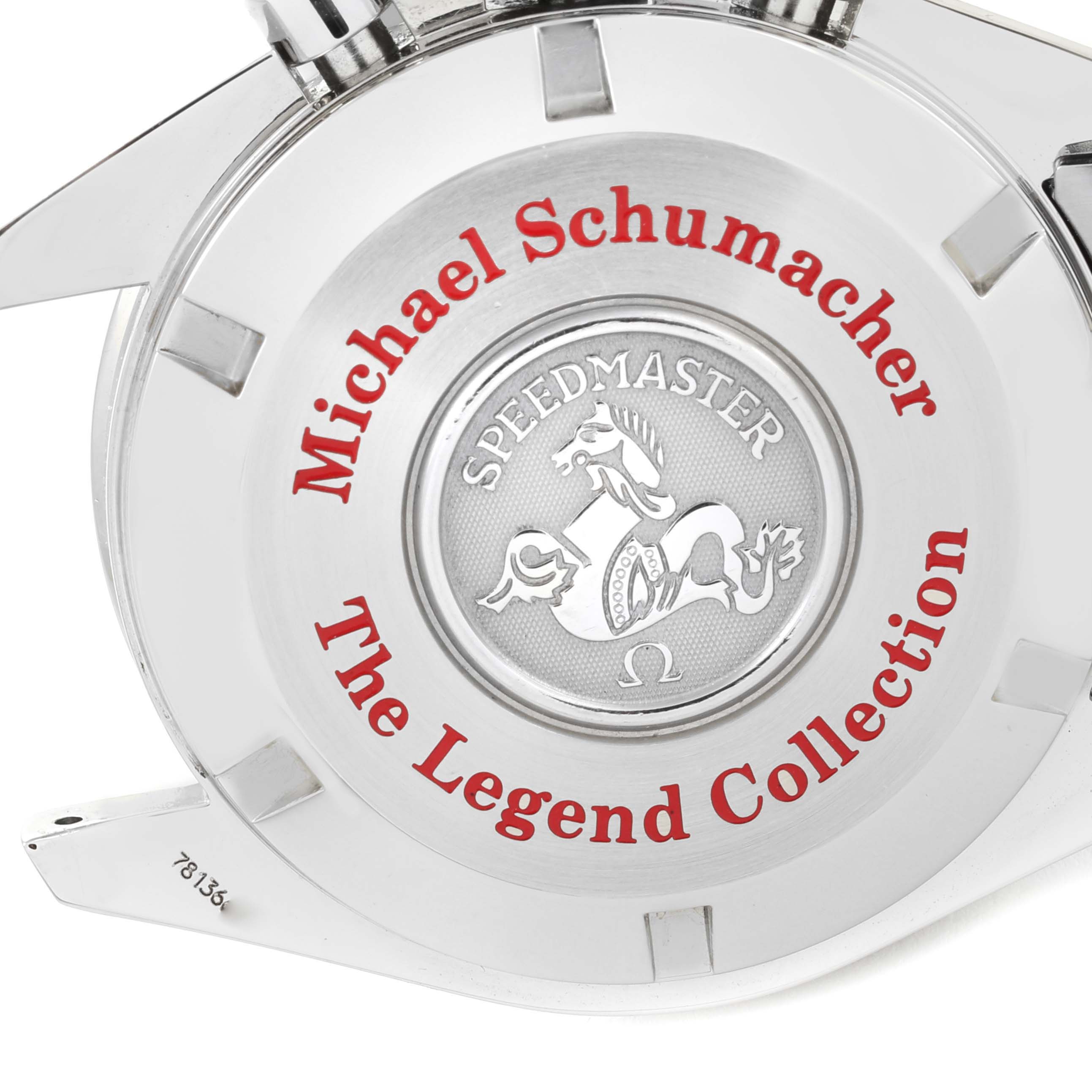 The image shows the case back of an Omega Speedmaster 3506.31.00 Men's Stainless Steel Silver Dial 3506.31.00 Men's Stainless Steel Silver Dial "The Legend Collection" watch featuring the name Michael Schumacher.