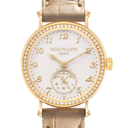 The image shows a Patek Philippe Calatrava 7121J-001 Women's Yellow Gold Silver Dial watch face straight on, highlighting the dial, bezel, crown, and strap.