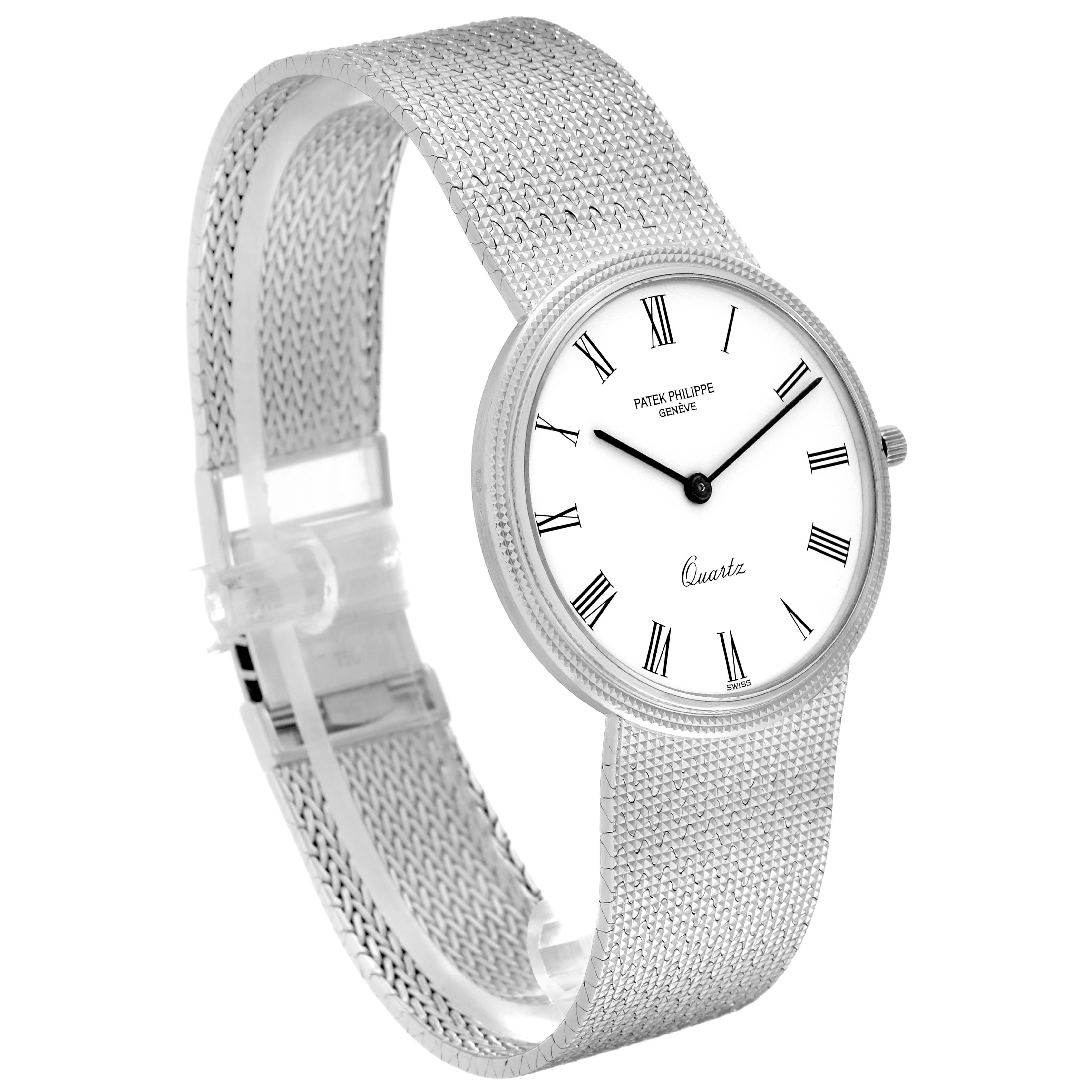 This image shows a Patek Philippe Calatrava 3744/1G Men's White Gold White Dial 3744/1G Men's White Gold White Dial watch at a three-quarter angle, highlighting the face, mesh bracelet, and crown.