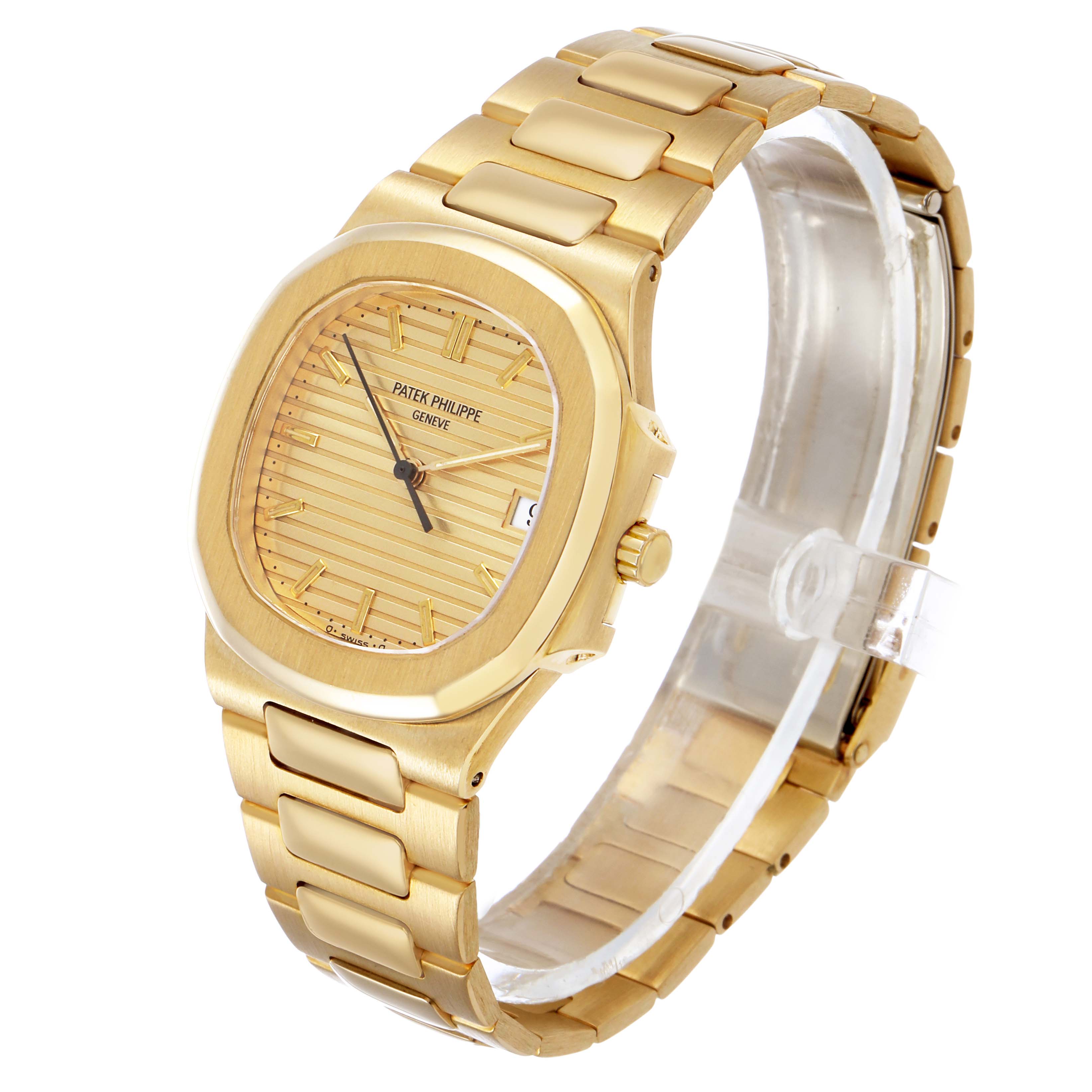 The Patek Philippe Nautilus 3900/1J Women's Yellow Gold Champagne Dial watch is shown at a side angle, displaying its gold-toned case, bracelet, and face.