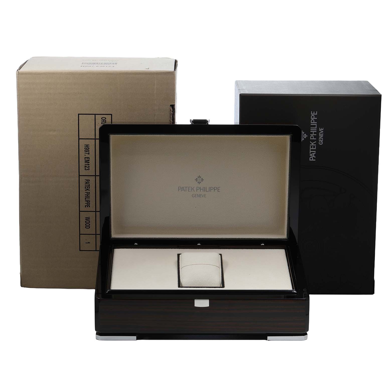 The image shows the packaging for a Patek Philippe Nautilus 3900/1J Women's Yellow Gold Champagne Dial, including an opened watch box and outer boxes.