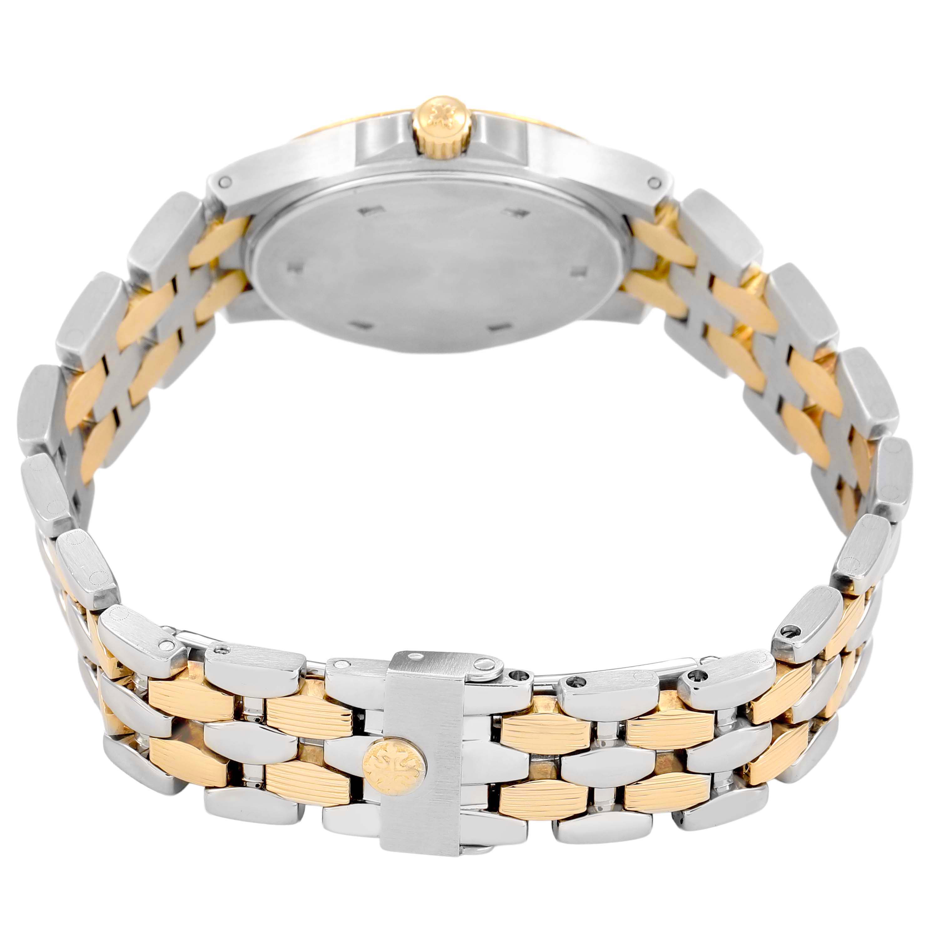 The image shows the back and bracelet of a Patek Philippe Neptune 4880/1JA Womens Steel and Gold (two tone) Black Dial watch at an angle, featuring the two-tone metal design and clasp.