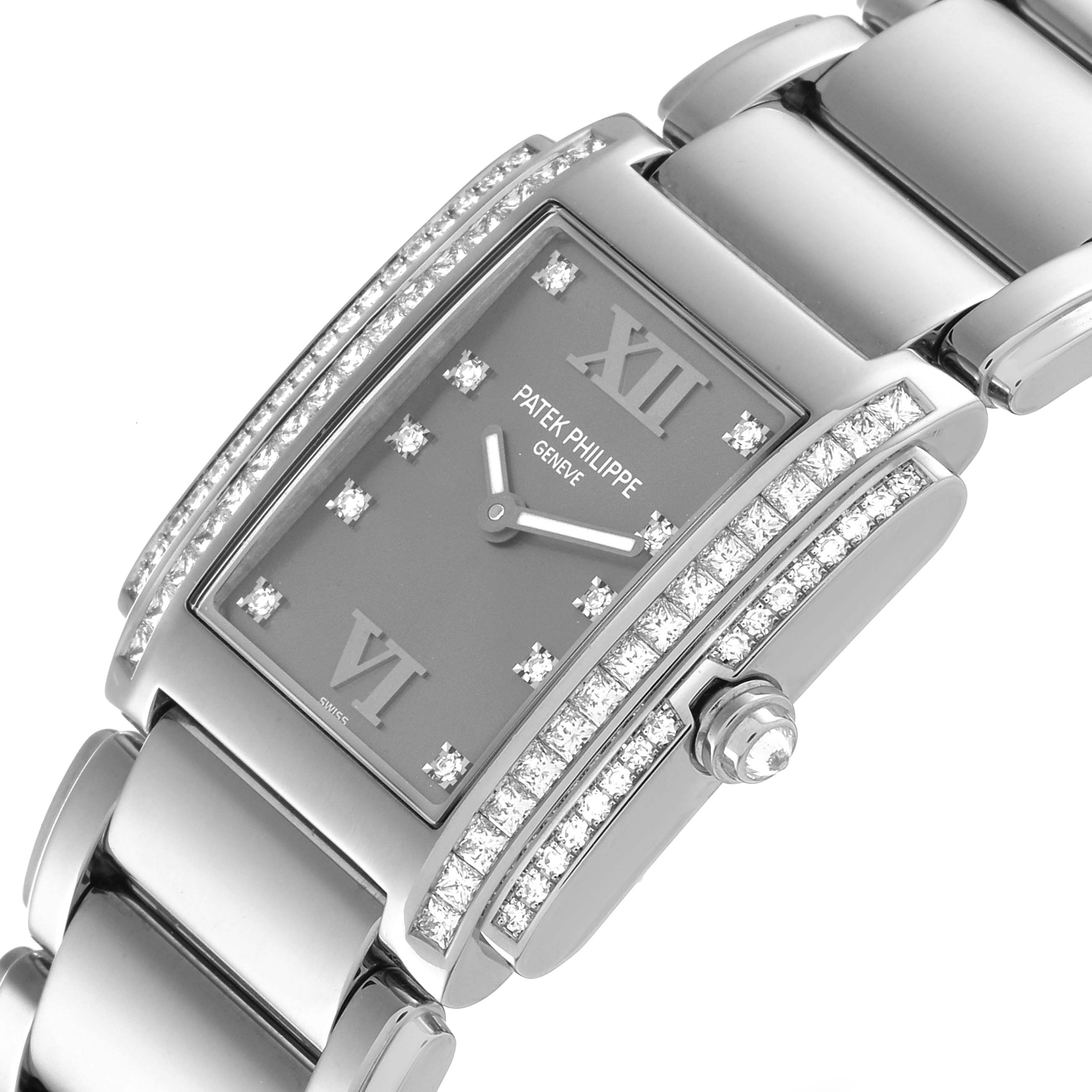 This is a close-up angle view of the Patek Philippe Twenty-4 4910/20 Women's White Gold Grey Dial 4910/20 Women's White Gold Grey Dial model, showing the rectangular face, diamond bezel, and part of the bracelet.