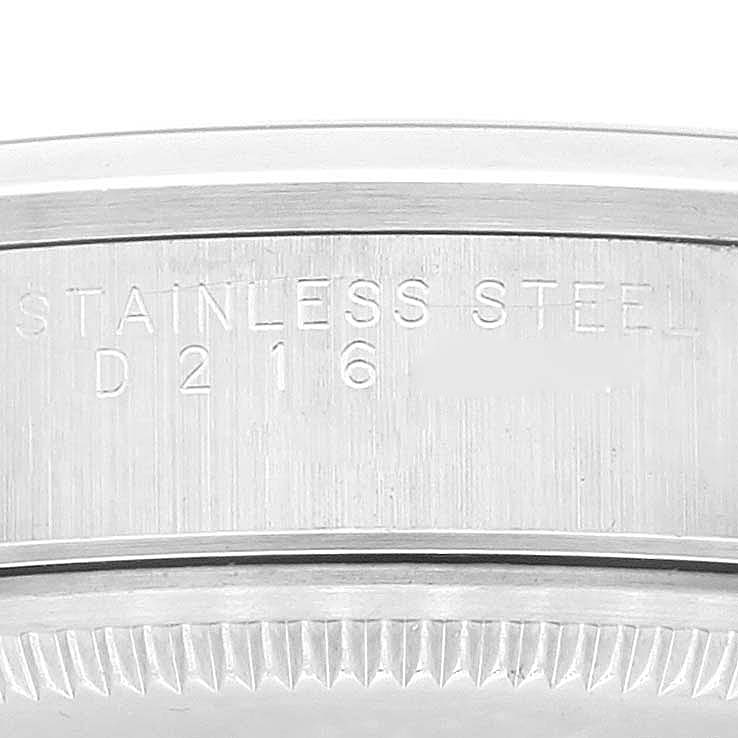 This image shows a close-up of the engraved stainless steel casing of the Rolex Air-King 14000 Men's Stainless Steel Silver Dial 14000 Men's Stainless Steel Silver Dial watch.