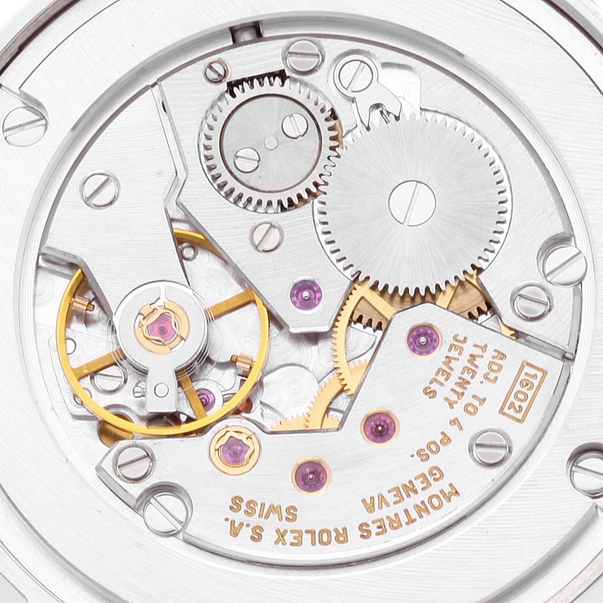 The image shows a close-up of the internal mechanisms of a Rolex Cellini 5115 Men's White Gold Mother of Pearl Dial 5115 Men's White Gold Mother of Pearl Dial watch, focusing on gears and jewels.