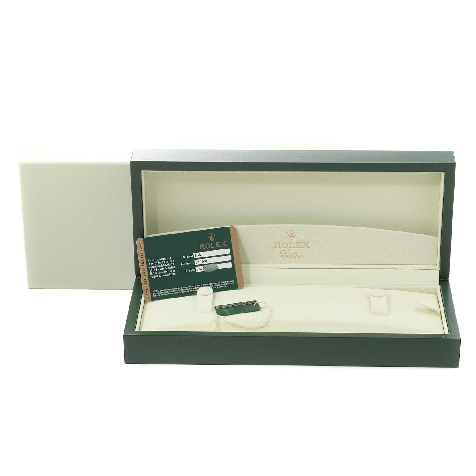 The image shows the open box of a Rolex Cellini 5115 Men
s Yellow Gold Mother of Pearl Dial 5115 Men
s Yellow Gold Mother of Pearl Dial watch, including the warranty card and tags.