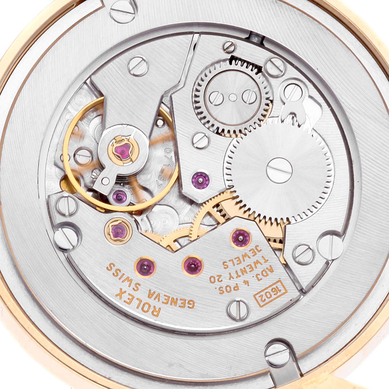 This image shows the intricate inner mechanical movement of the Rolex Cellini 5115 Men
s Yellow Gold Mother of Pearl Dial 5115 Men
s Yellow Gold Mother of Pearl Dial watch at a close-up angle.