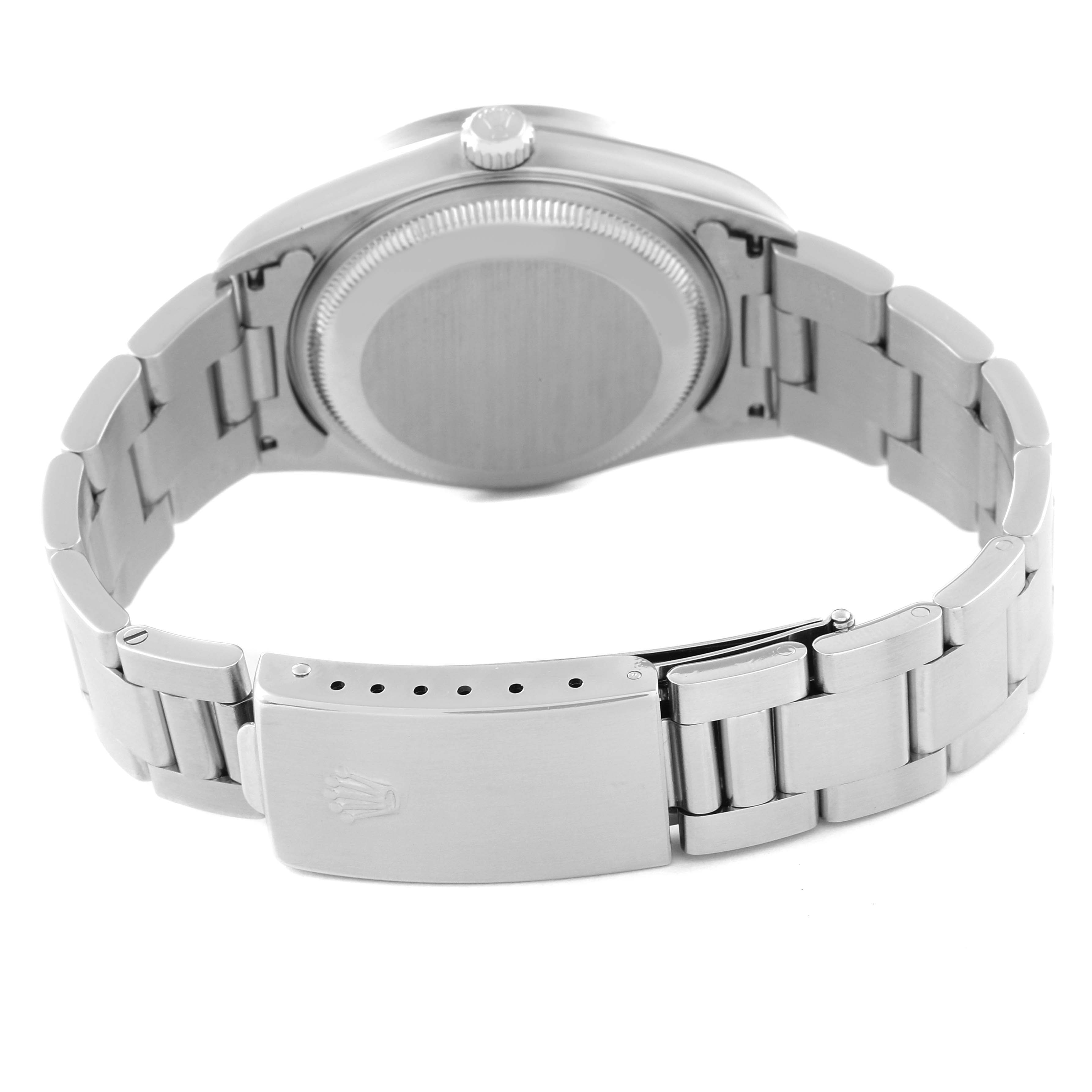 This image shows the back case and clasp of a Rolex Date 15210 Men's Stainless Steel Silver Dial 15210 Men's Stainless Steel Silver Dial watch.