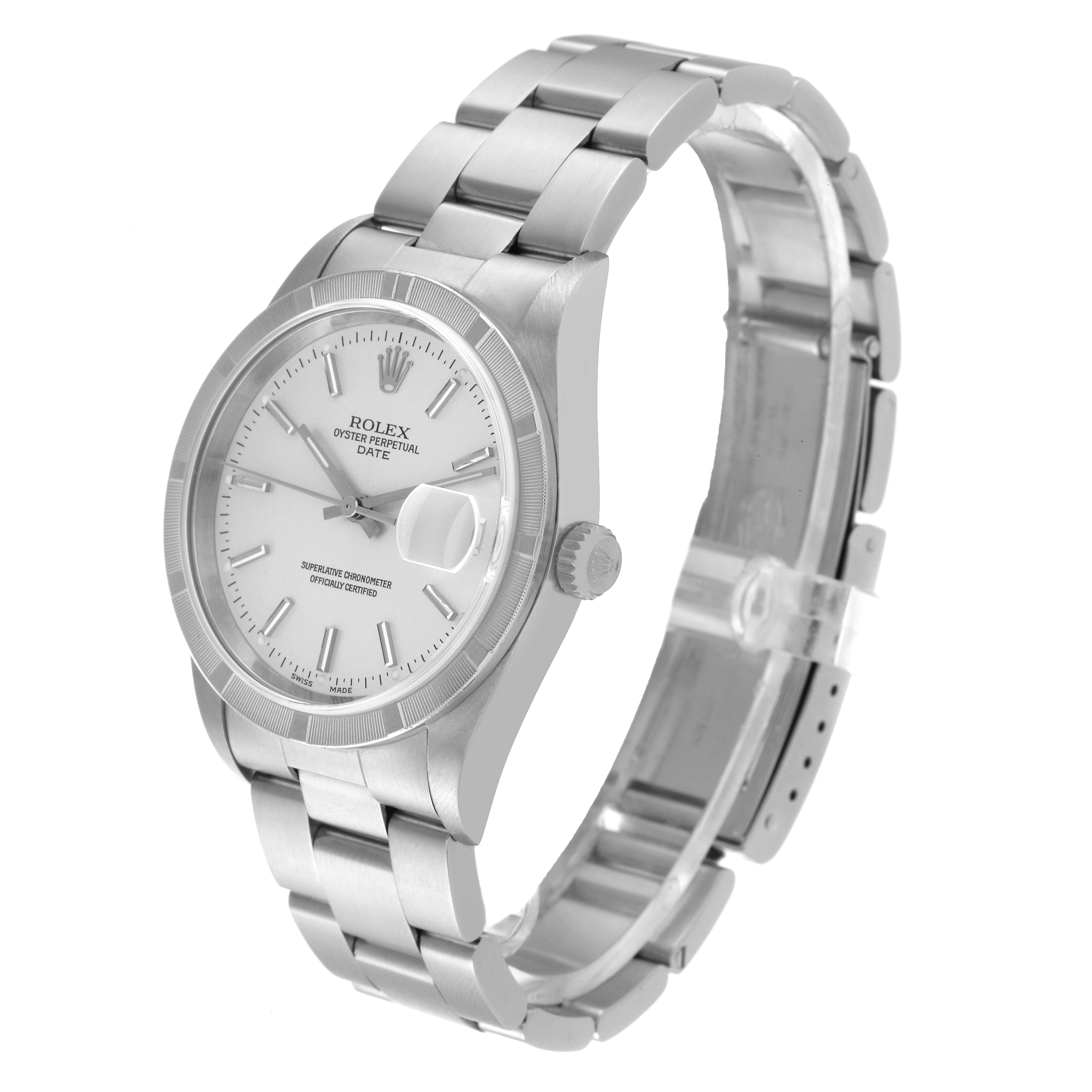 The image shows a Rolex Oyster Perpetual Date model watch at a three-quarter angle, highlighting the face, bezel, and bracelet.