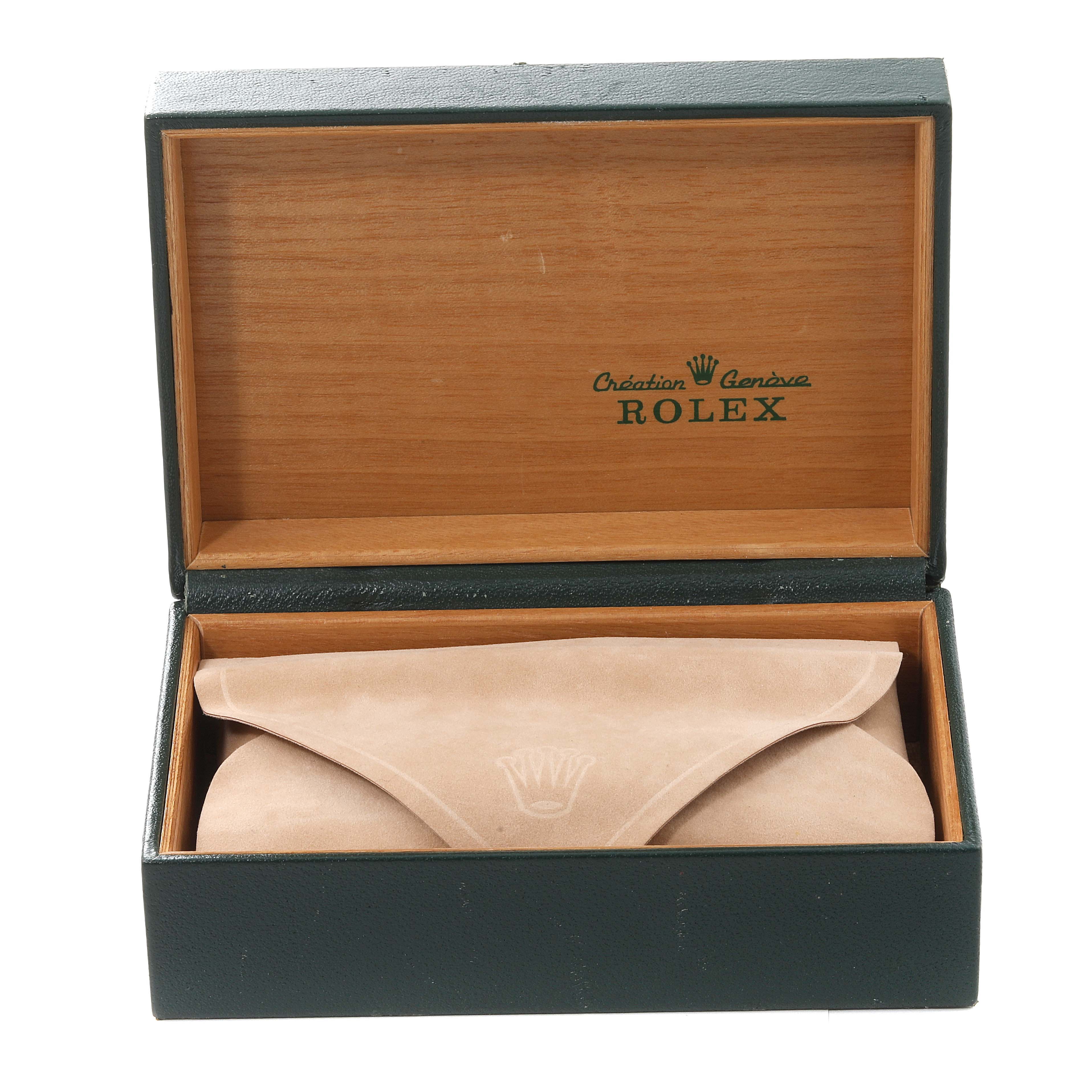 The image shows a Rolex Date 15210 Men's Stainless Steel Silver Dial 15210 Men's Stainless Steel Silver Dial model watch inside a beige suede pouch within an open green and wooden Rolex box.