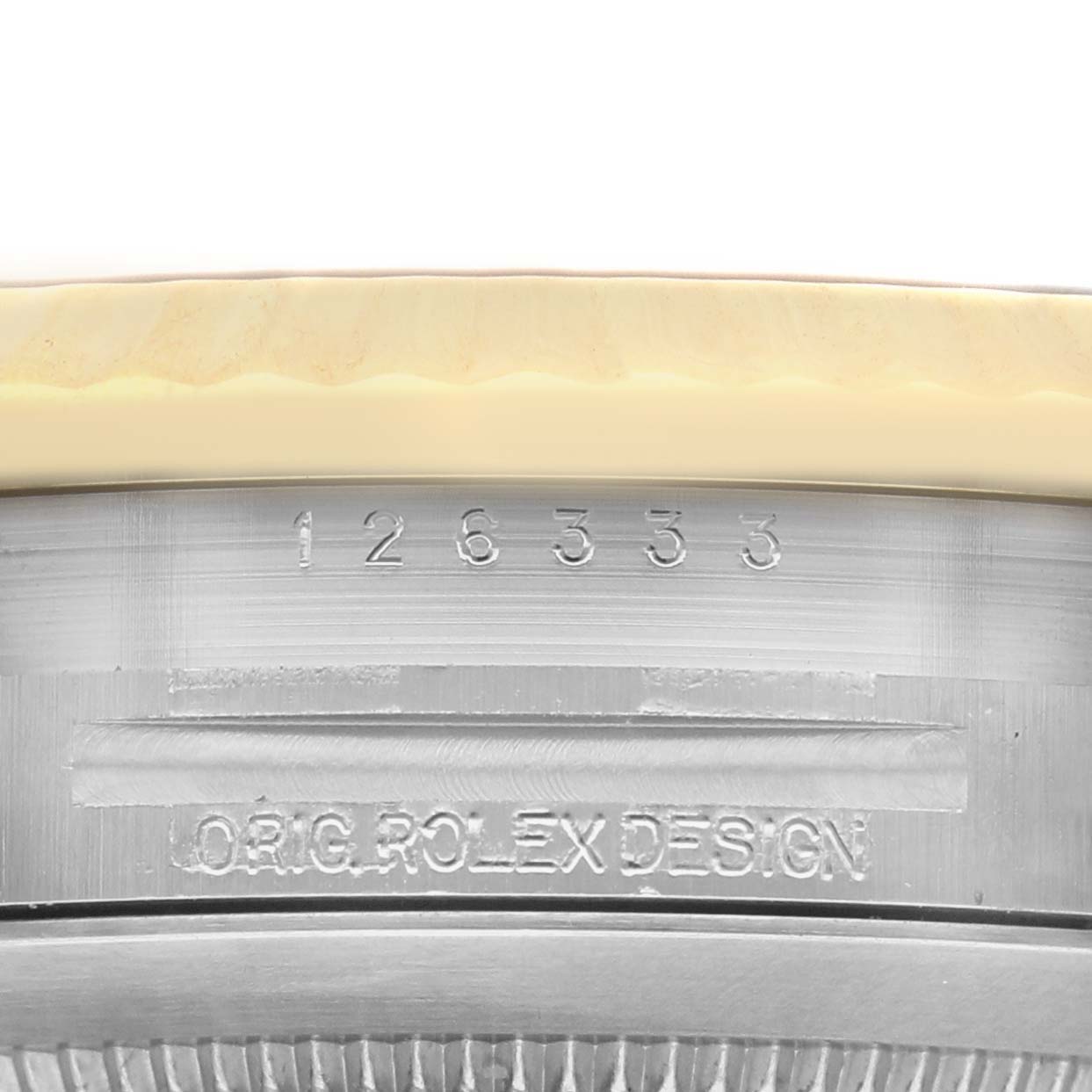 The image shows the side of the Rolex Datejust 41 126333 Men's Steel and Gold (two tone) Champagne Dial's case, highlighting the model number and engraving details.